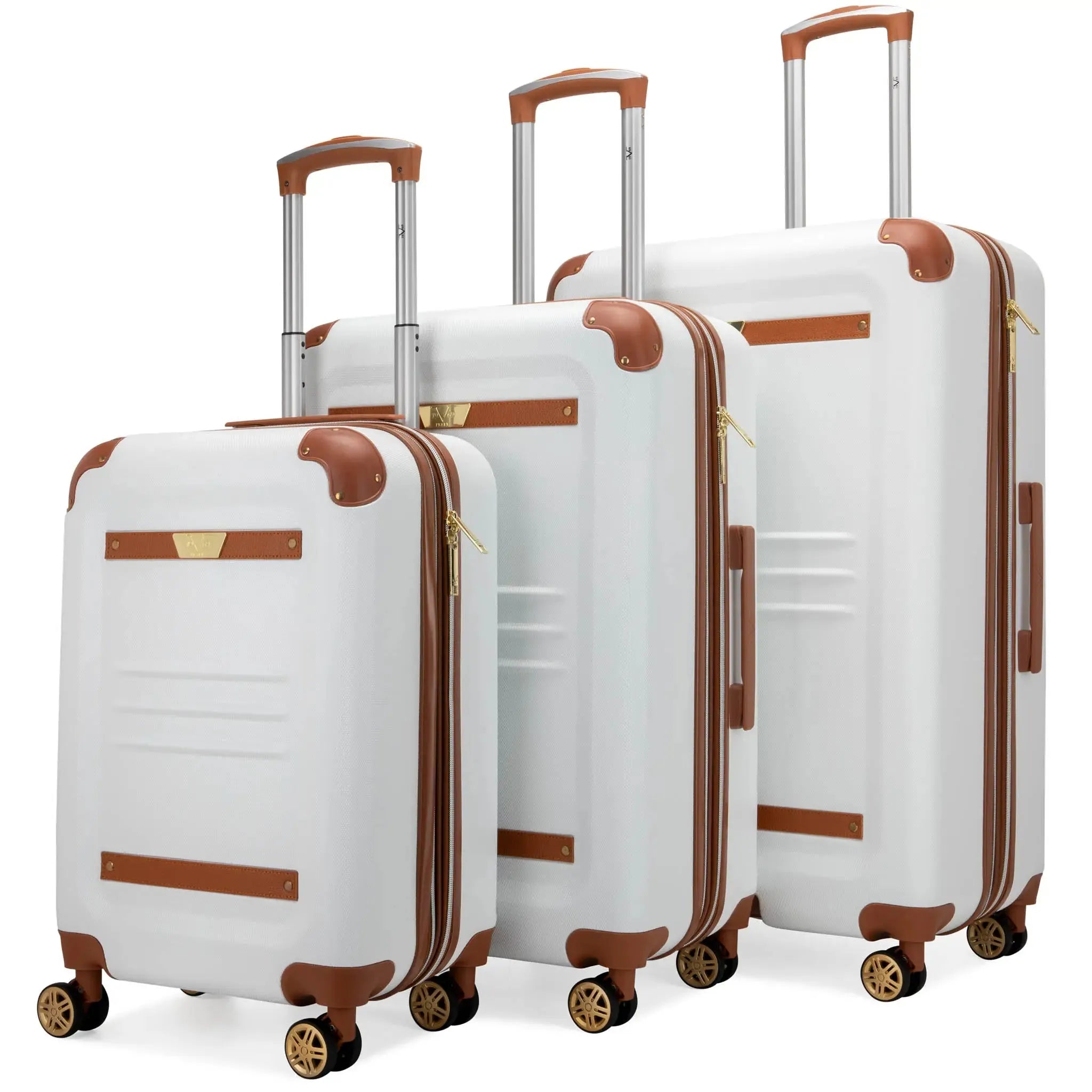 Set of three white suitcases with brown accents on a white background