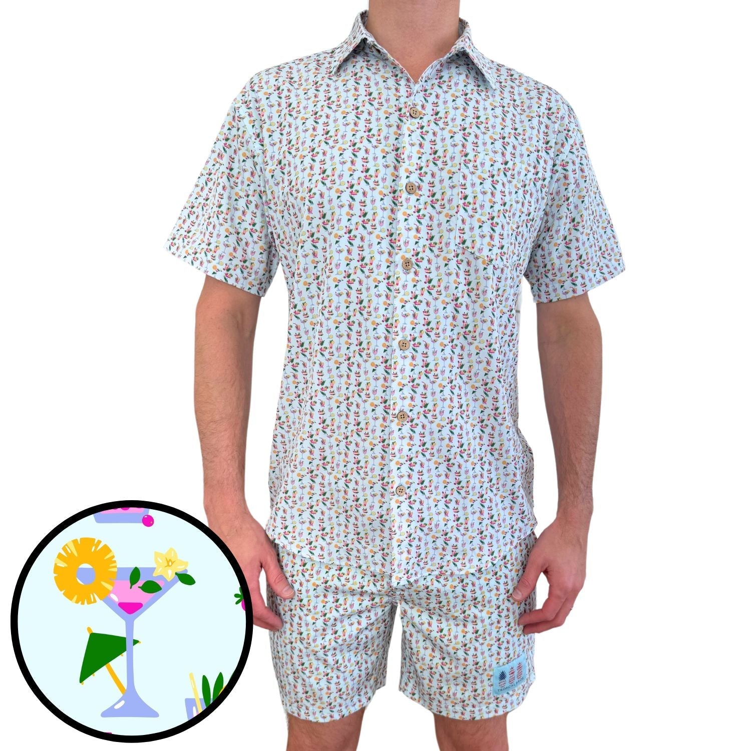 Short-sleeve shirt and shorts set with a small inset of a cocktail graphic on a white background