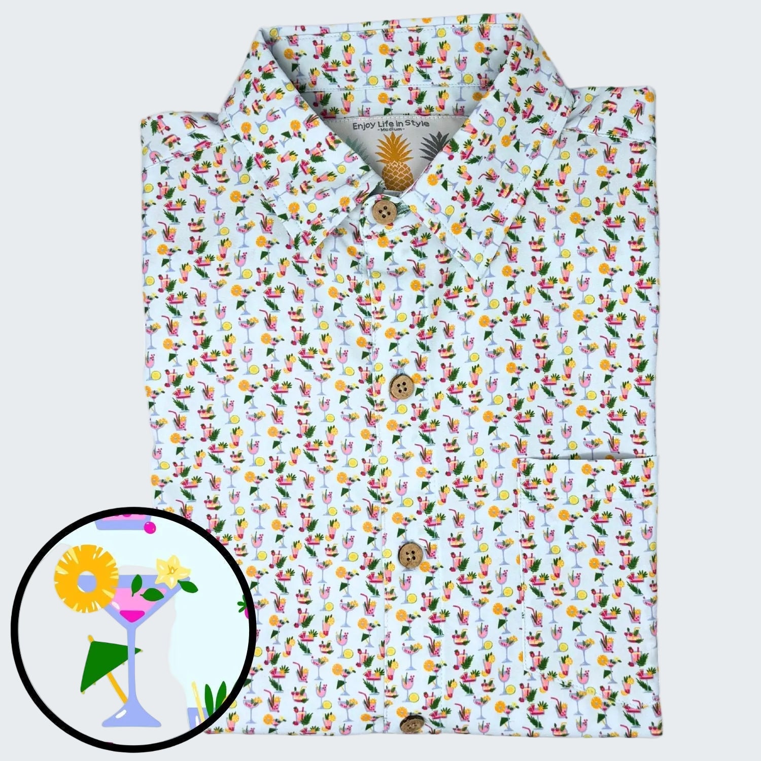 Floral patterned shirt with a close-up inset of a cocktail design on a white background