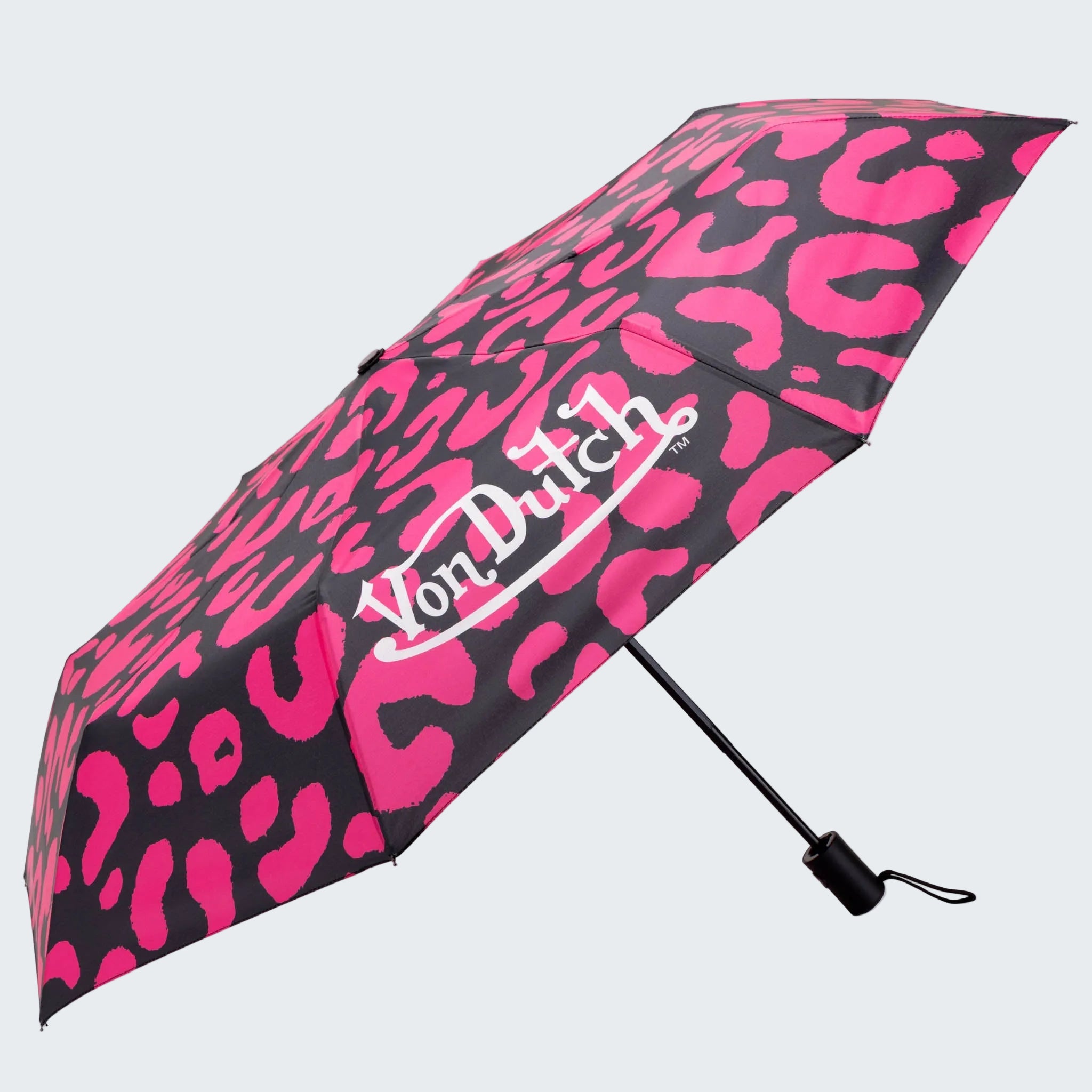 Compact umbrella with pink leopard print and Von Dutch logo on a white background