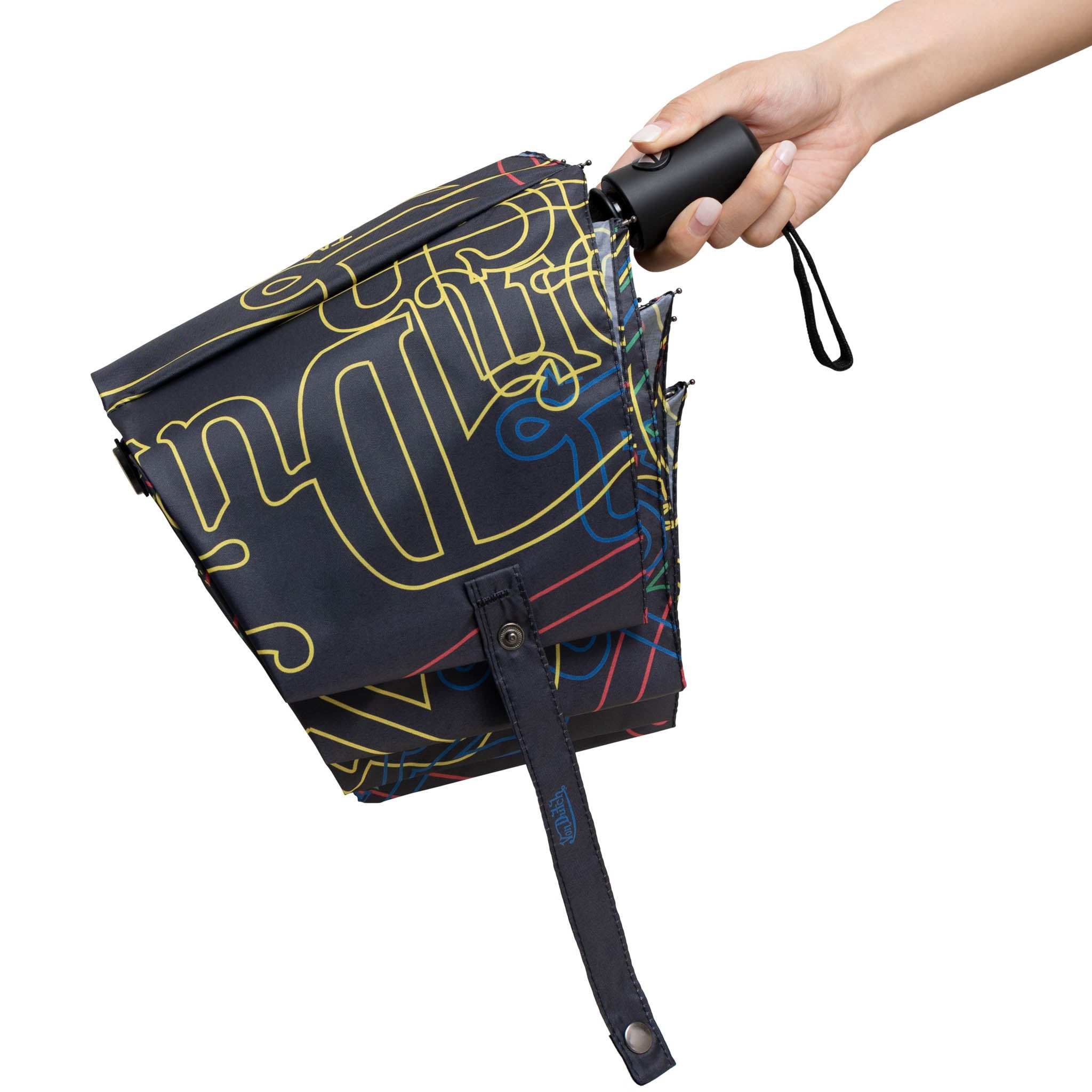 Hand holding a folded umbrella with colorful text design on a white background