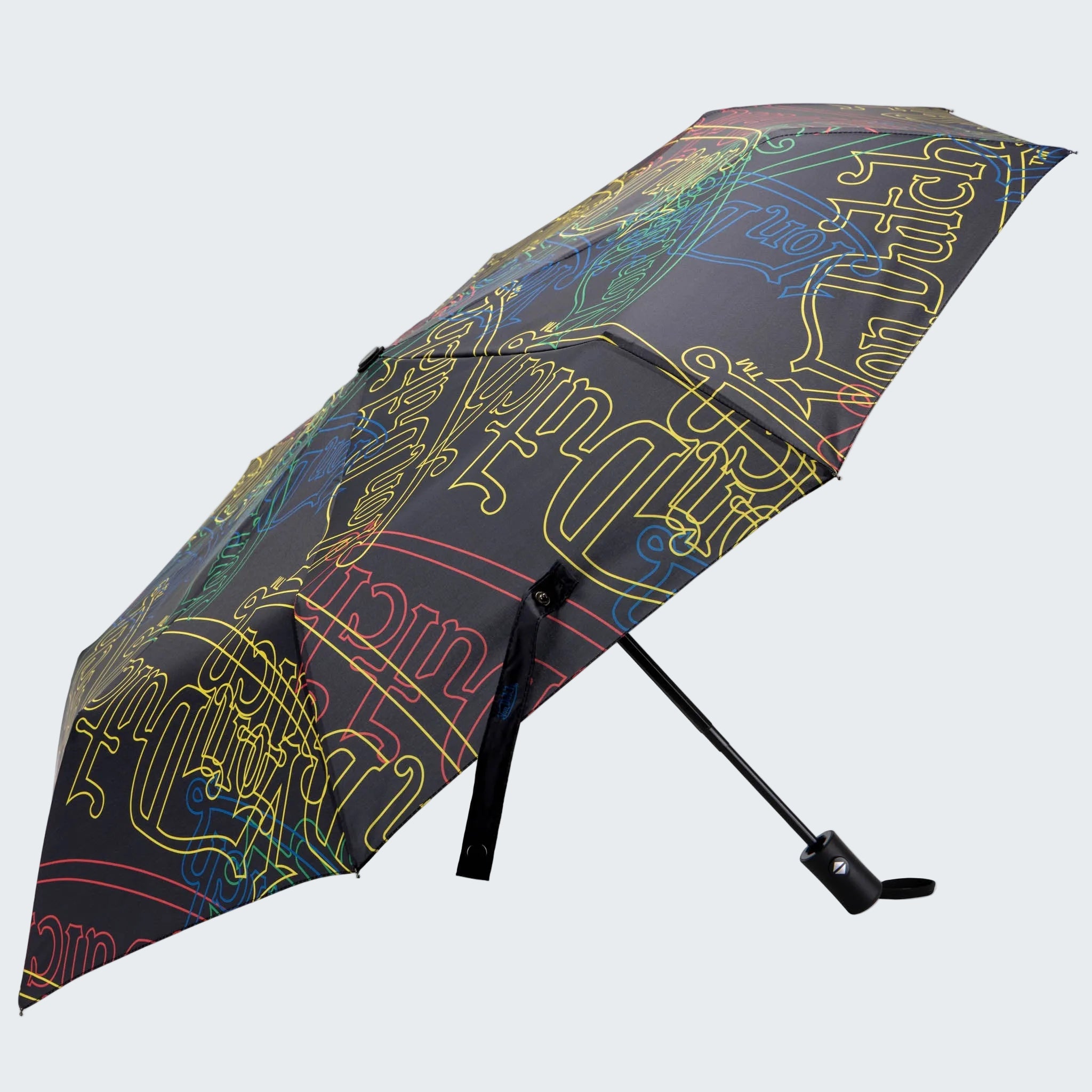 Colorful umbrella with abstract design on a white background