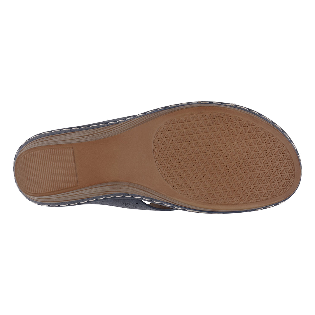 Top view of a shoe sole with brown rubber outsole on a white background