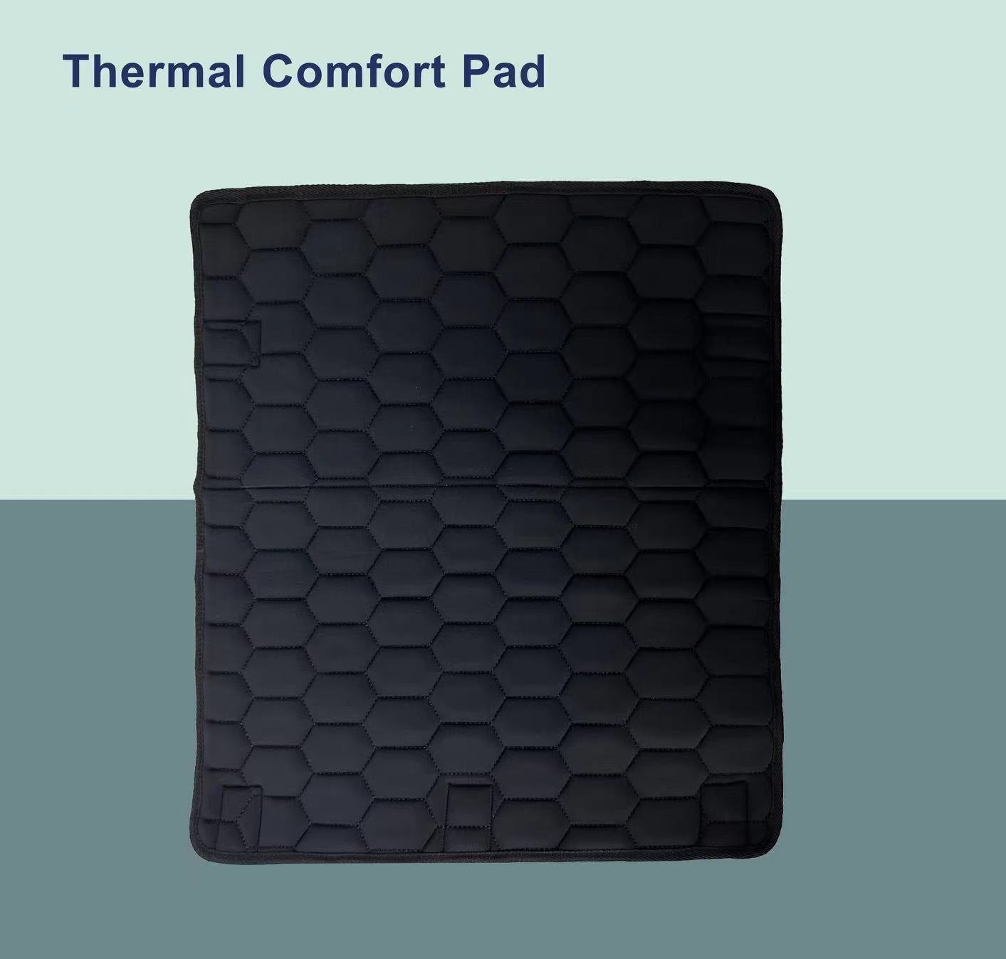 Black thermal comfort pad on a two-tone background