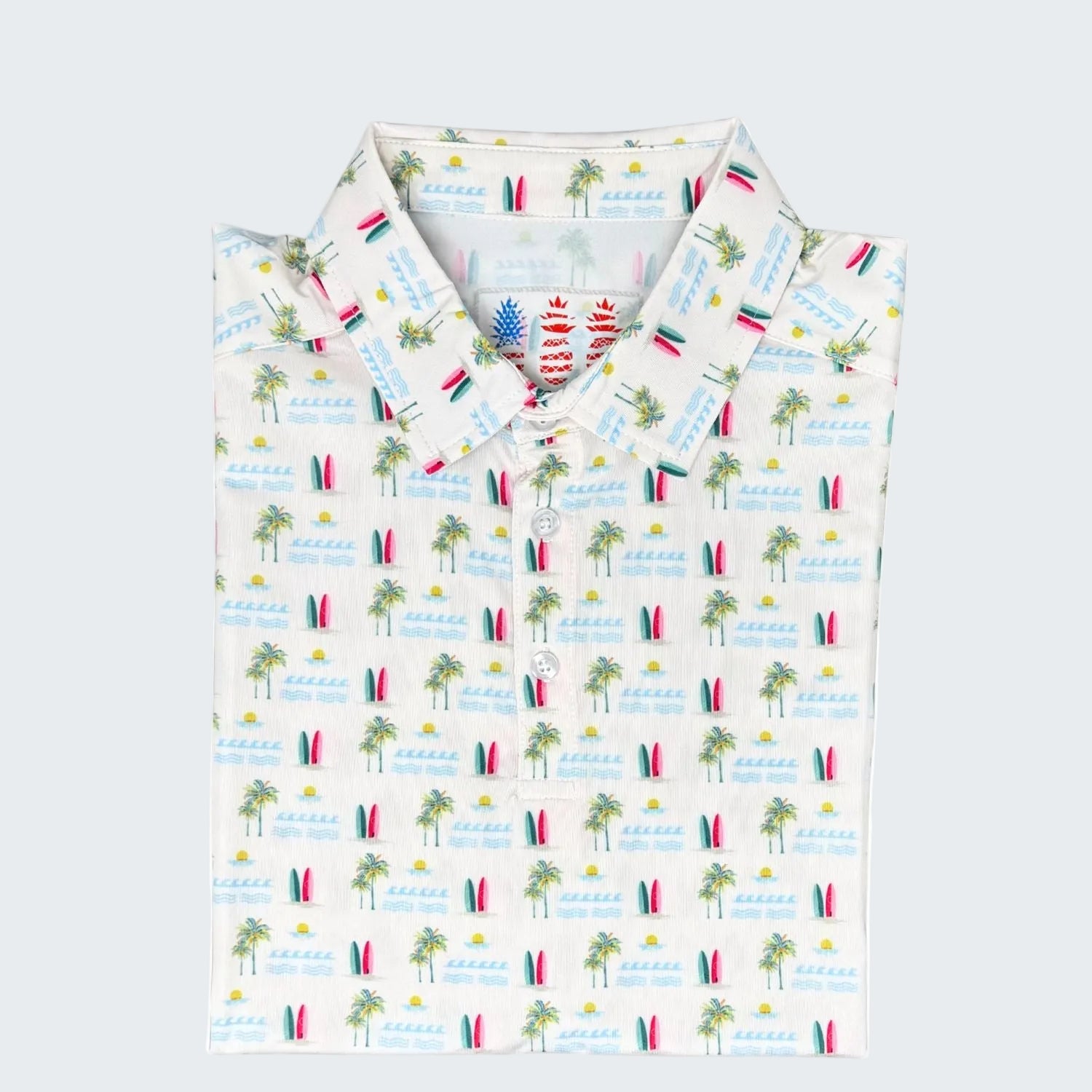 Polo shirt with beach-themed pattern on a white background, labeled '10 Year Anniversary 2026 Limited Edition'.