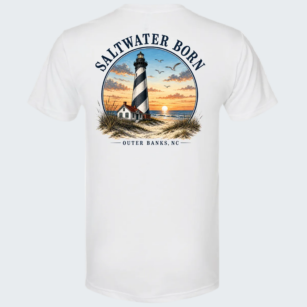 White short-sleeve t-shirt showing the back with a large circular graphic of a lighthouse at sunset, birds, and the text 'SALTWATER BORN' and 'OUTER BANKS, NC'.