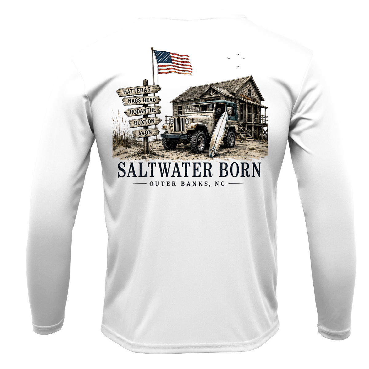 White long-sleeve t-shirt shown from the back, featuring a large graphic print of a coastal scene with a rustic cabin, military truck, surfboard, wooden signpost, and an American flag. The text 'SALTWATER BORN' and 'OUTER BANKS, NC' is printed below the graphic.