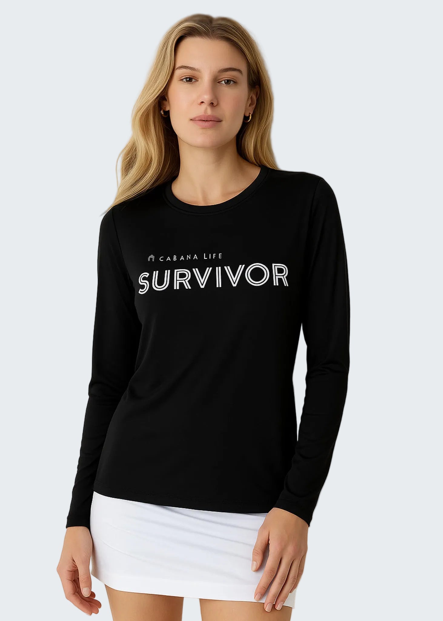 Woman wearing a black long-sleeve shirt with 'SURVIVOR' text on a white background