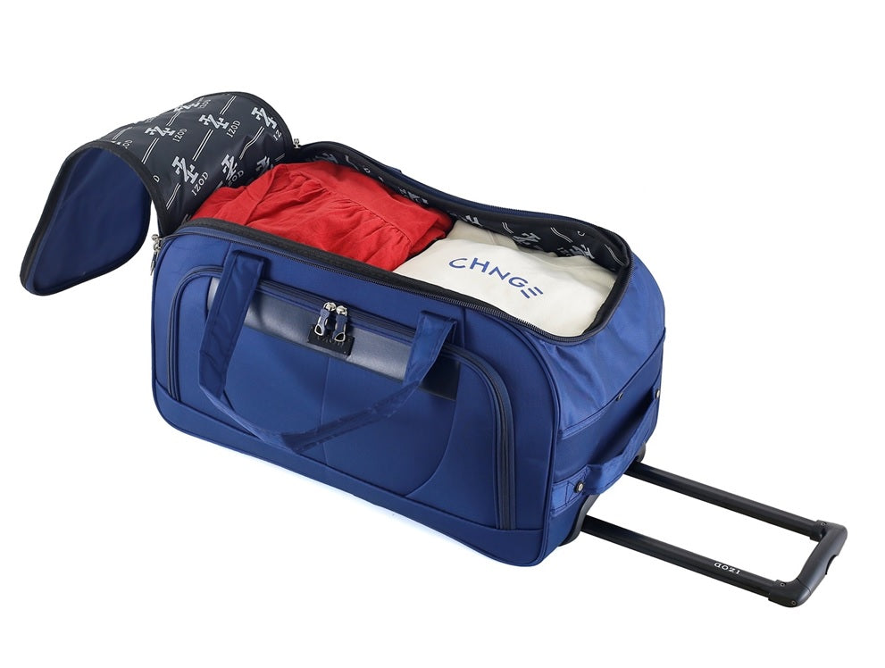 Blue rolling duffel bag with clothes partially packed on a white background