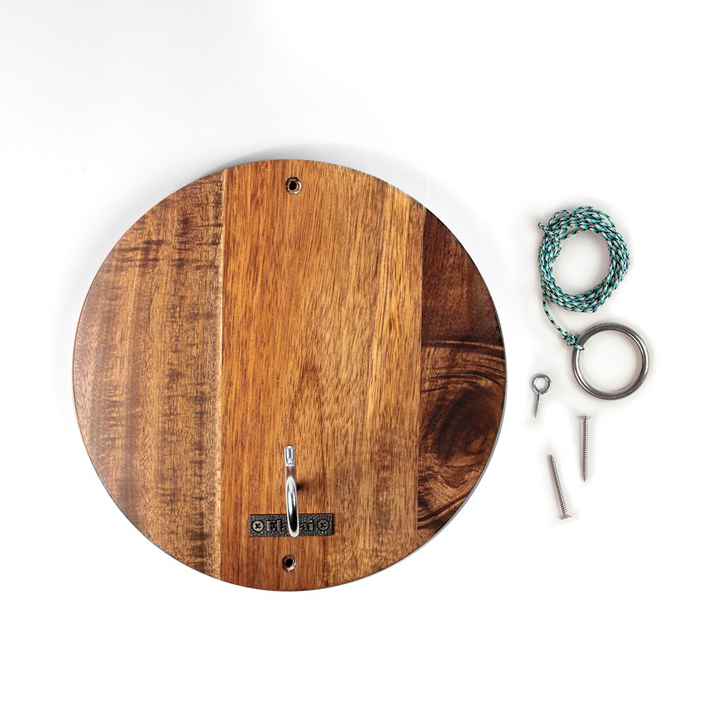 Wooden key holder with keys on a white background