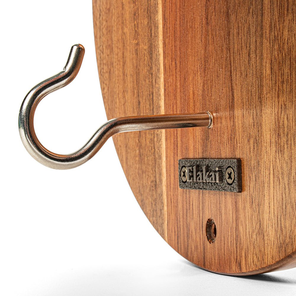 Wooden product with a metal hook and 'Elalai' branding on a white background