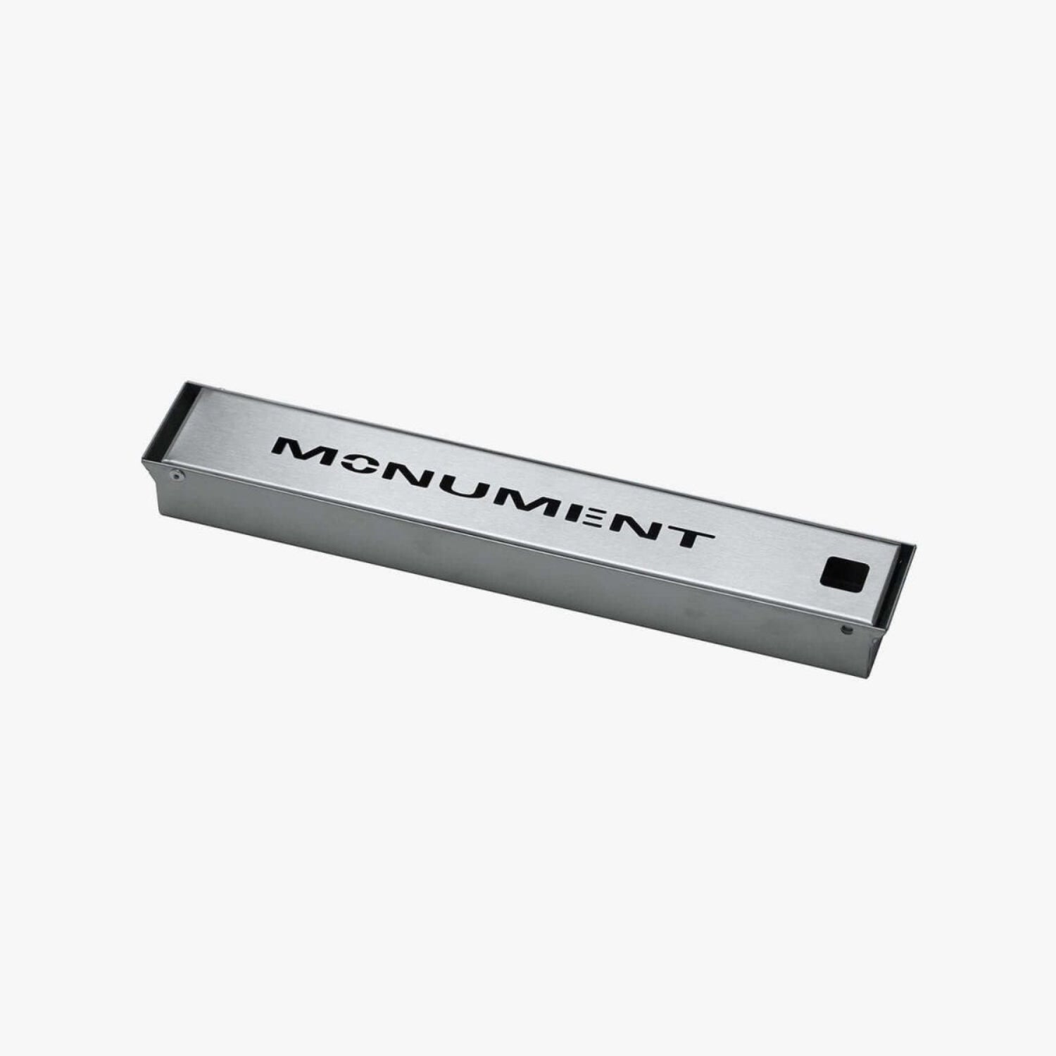Metallic rectangular object with 'MONUMENT' branding on a white background