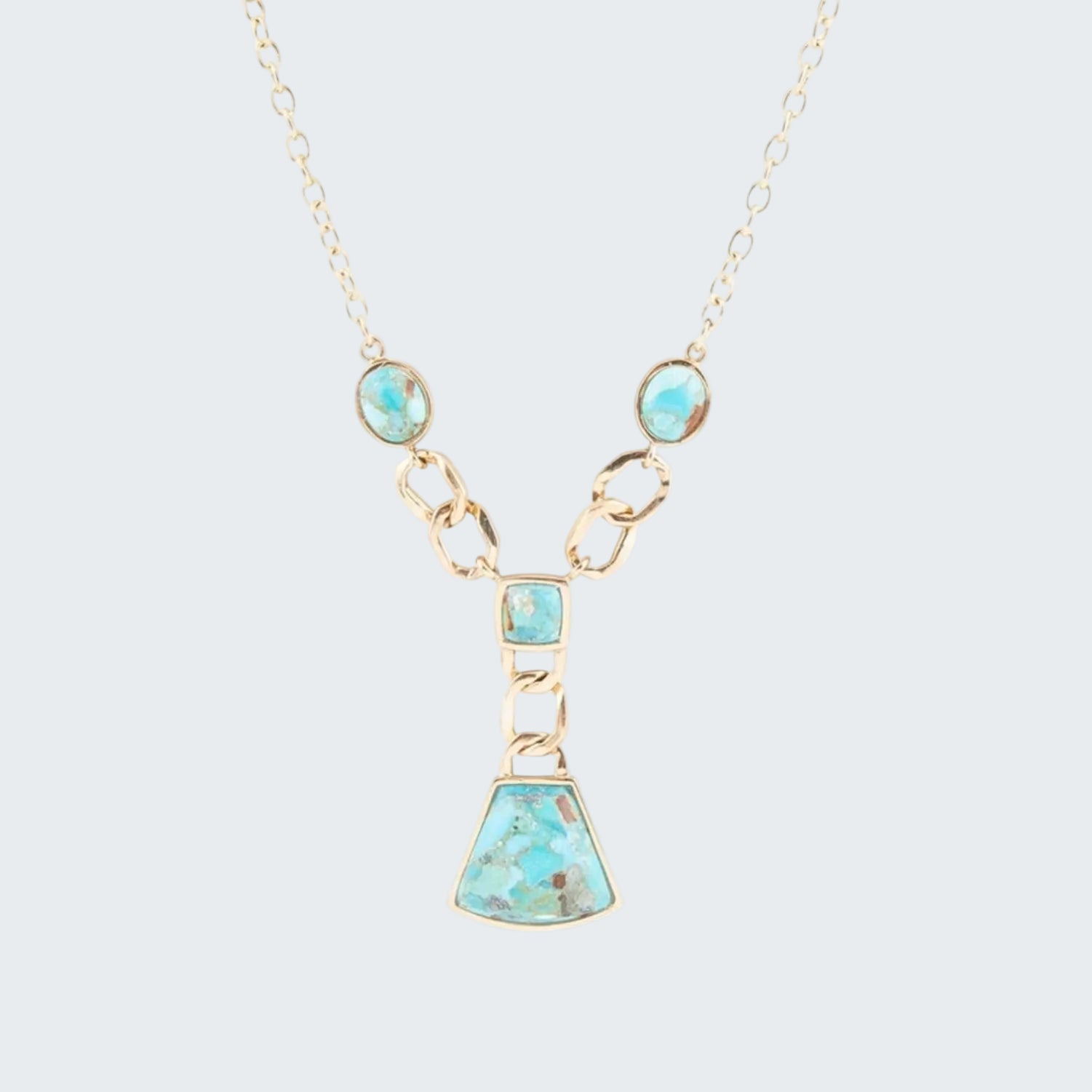 Necklace with turquoise stones on a white background