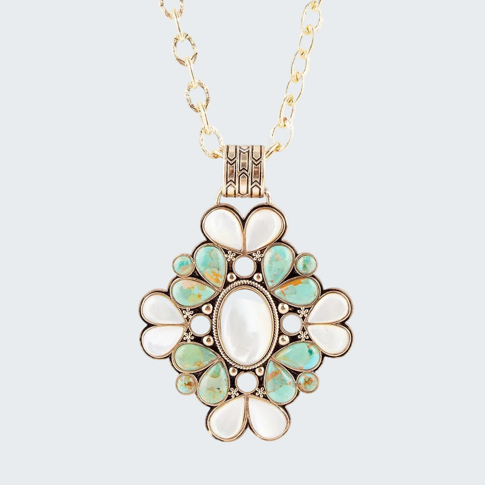 Necklace with a decorative pendant featuring turquoise and white stones on a white background