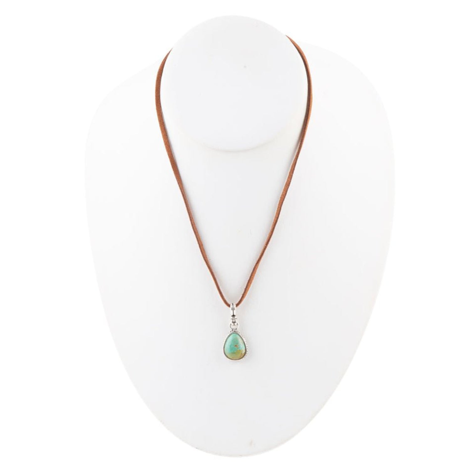 Necklace with a green teardrop pendant on a white mannequin bust.