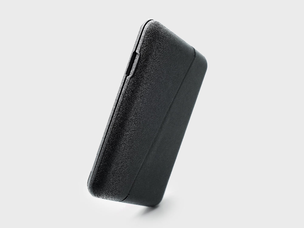 Black rectangular power bank on a light gray background