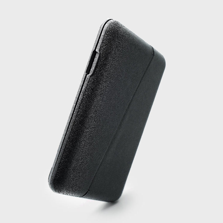 Black rectangular power bank on a light gray background