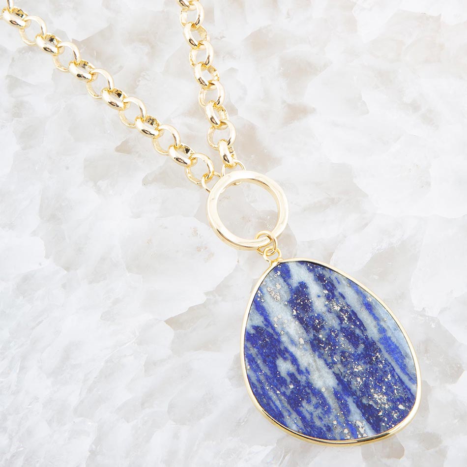 Necklace with a blue stone pendant on a white background
