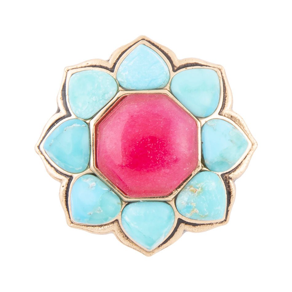 Jewelry item with pink center and turquoise stones on a white background