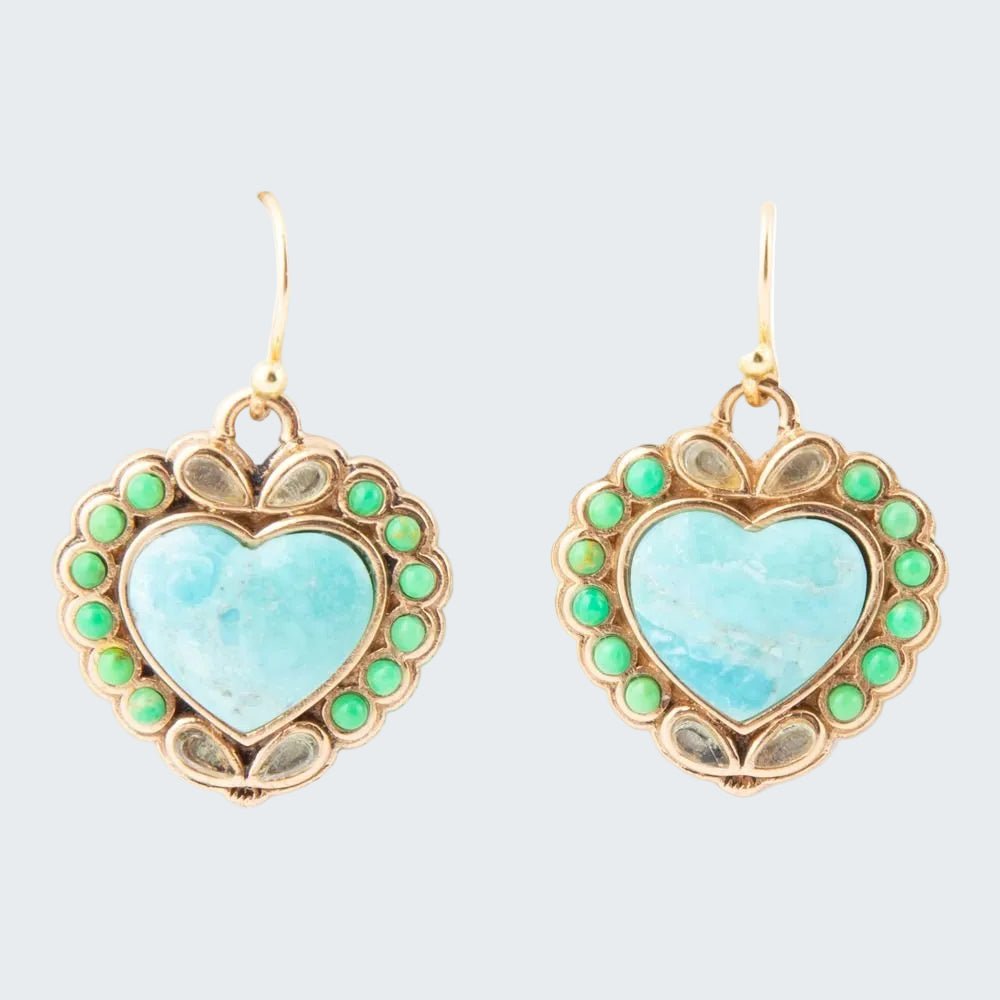 Heart-shaped earrings with turquoise centers and green accents on a white background