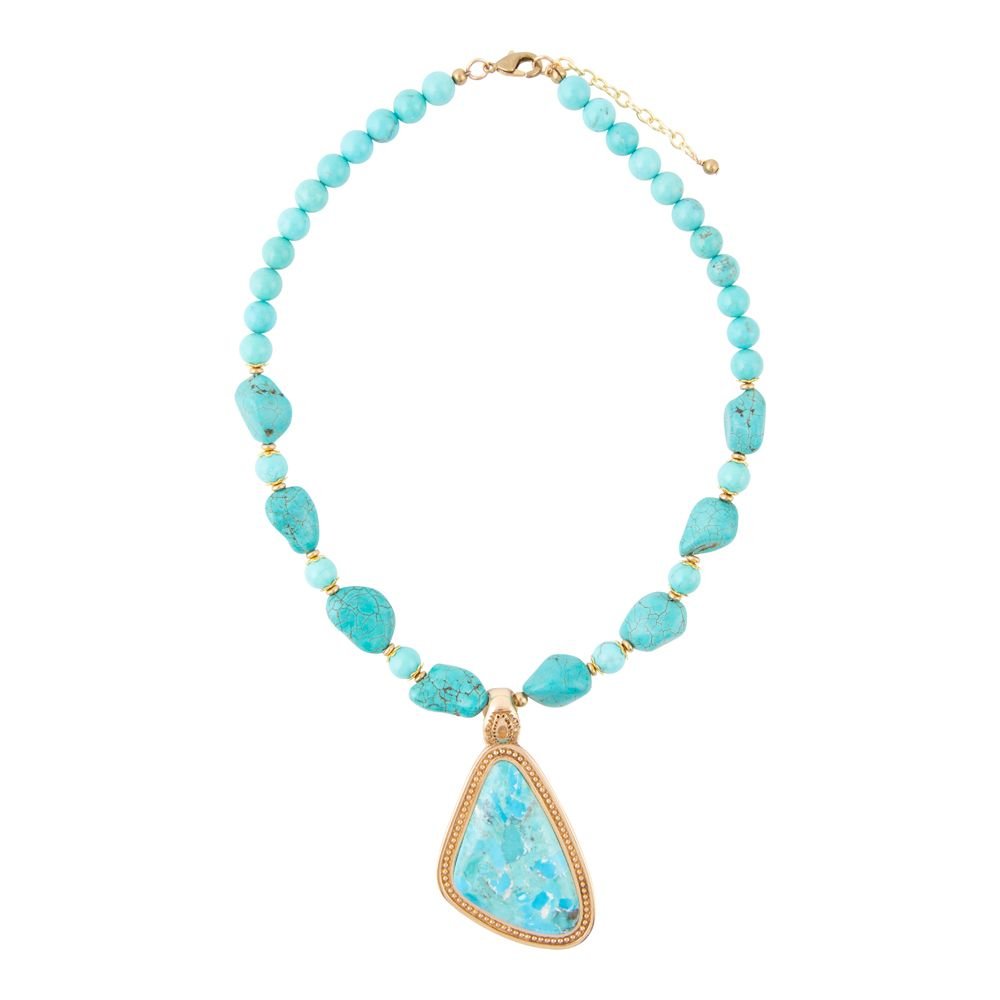 Turquoise beaded necklace with a large turquoise stone pendant on a white background