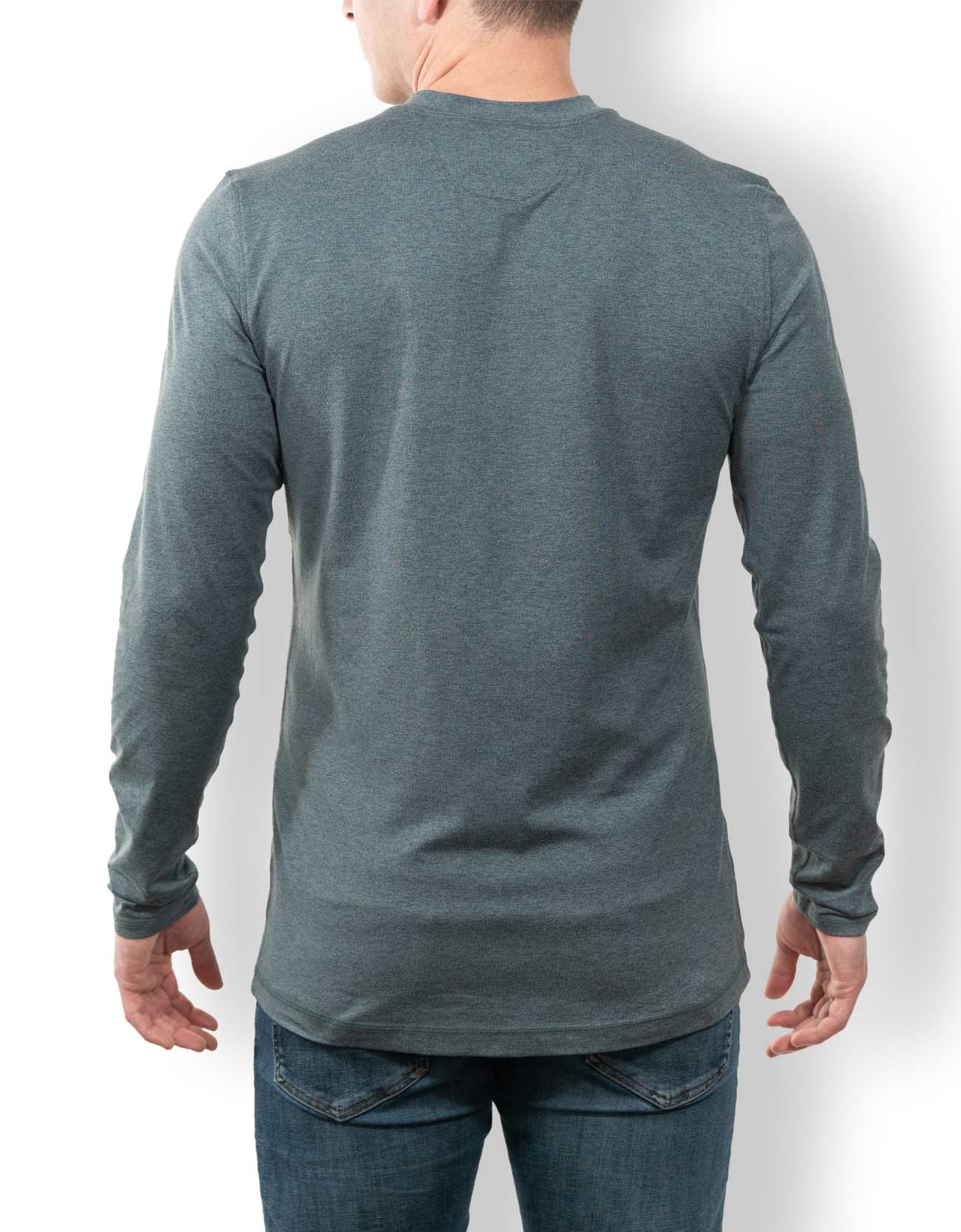 Person wearing a long-sleeve gray shirt against a white background