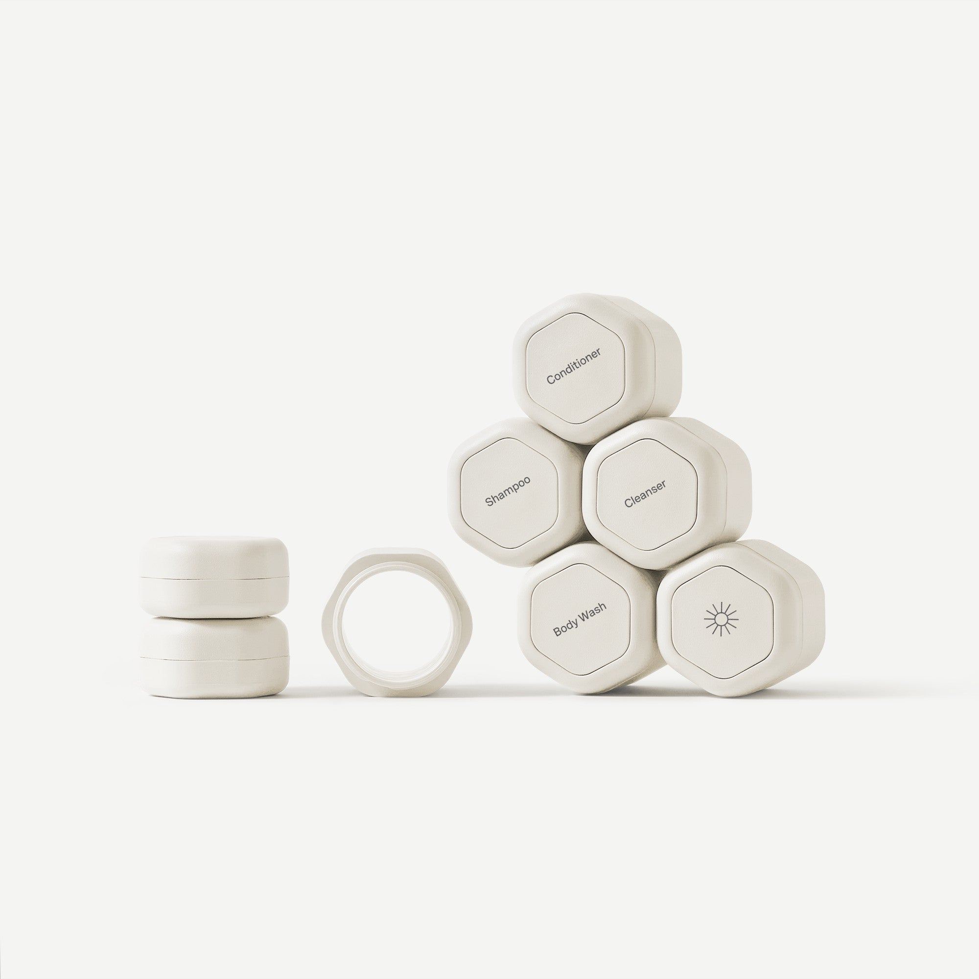 Set of hexagonal containers with labels on a white background