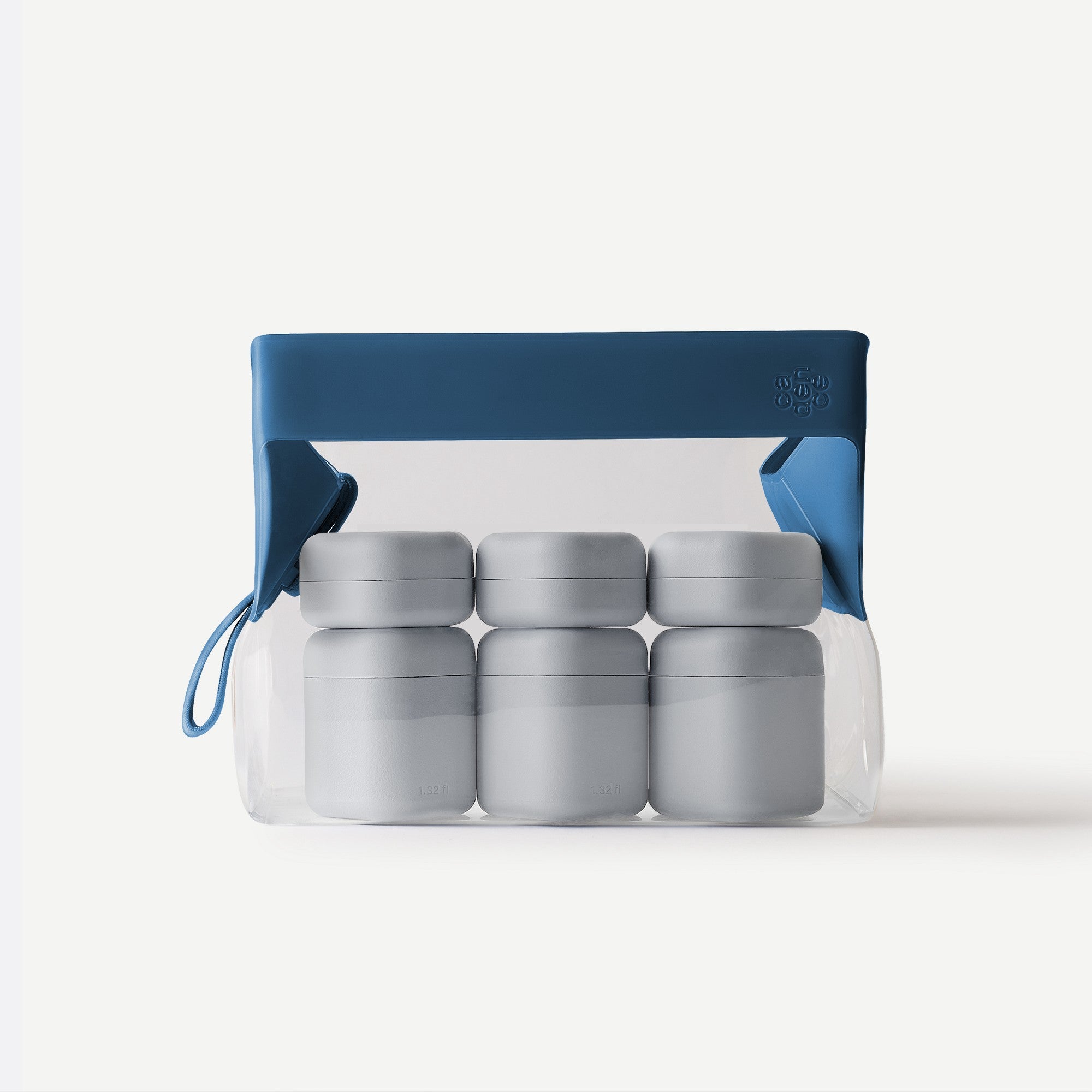Set of gray containers with a blue carrying case on a white background