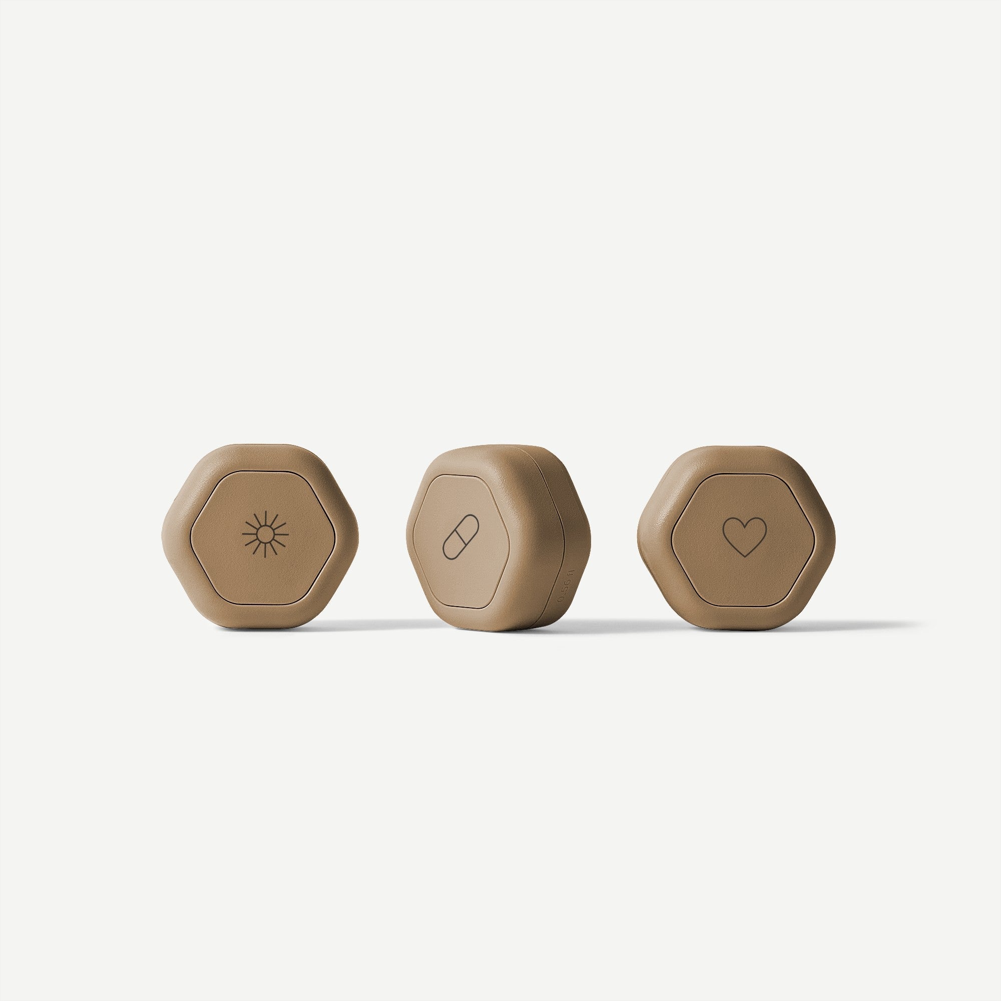 Three hexagonal devices with different symbols on a white background