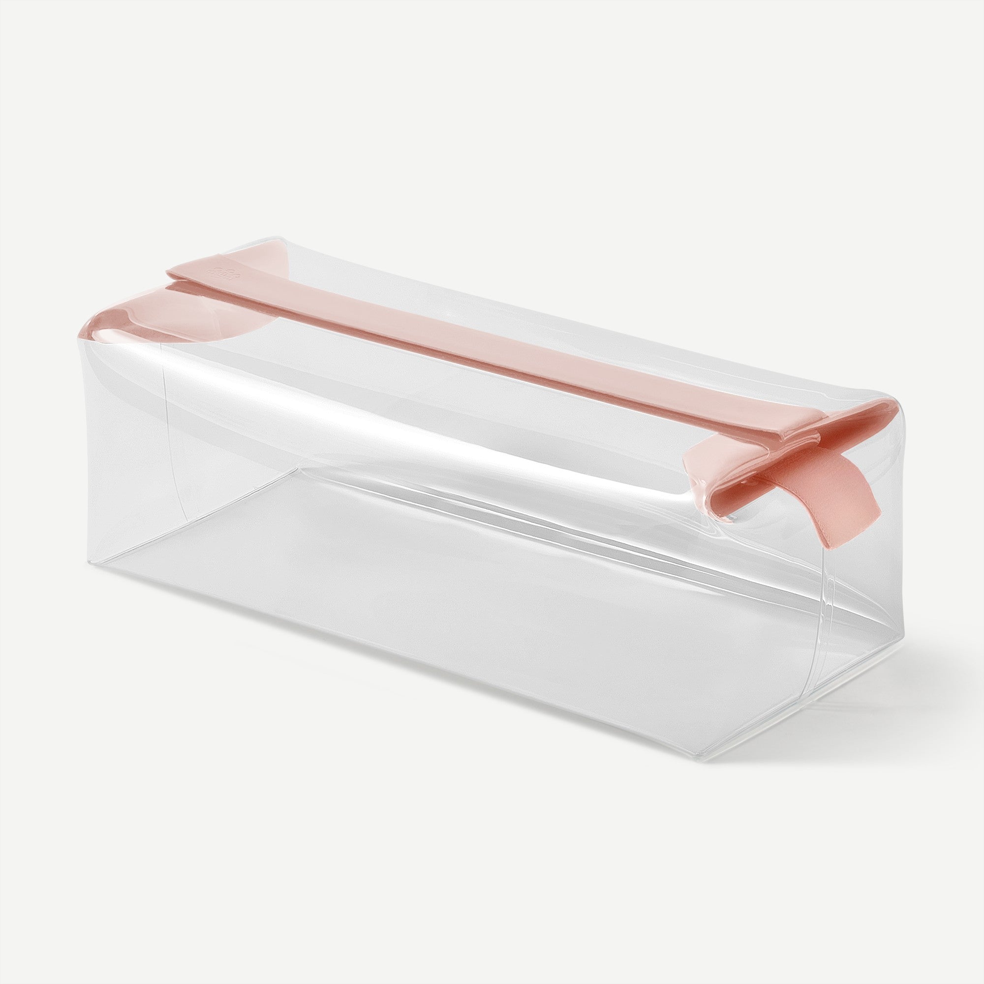 Clear plastic container with a pink lid on a white background