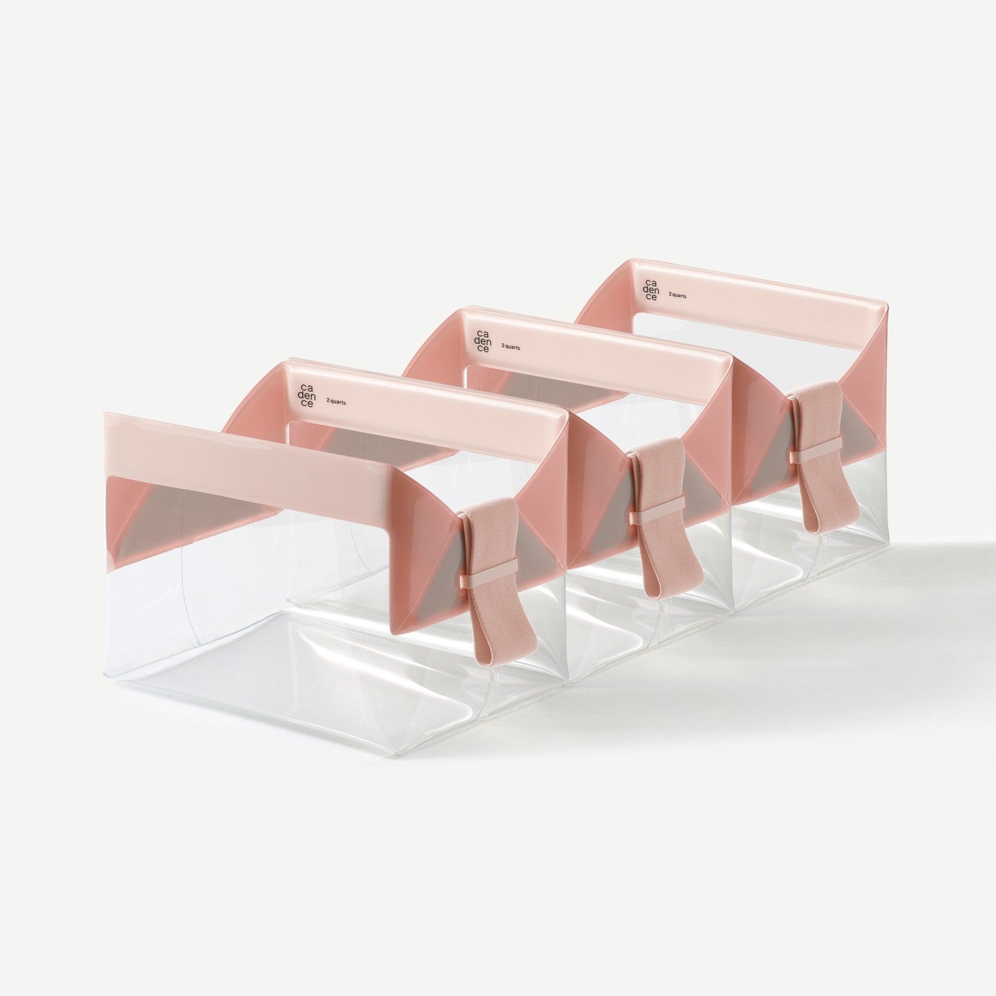 Set of pink geometric trays on a white background