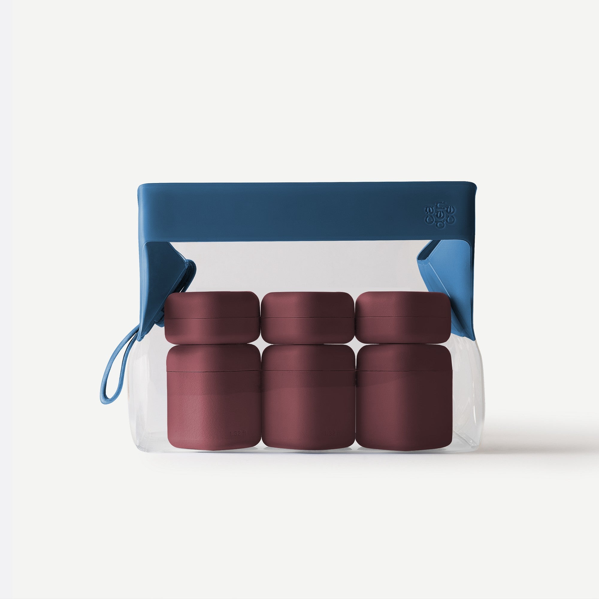 Set of four brown containers in a clear plastic pack with a blue lid on a white background