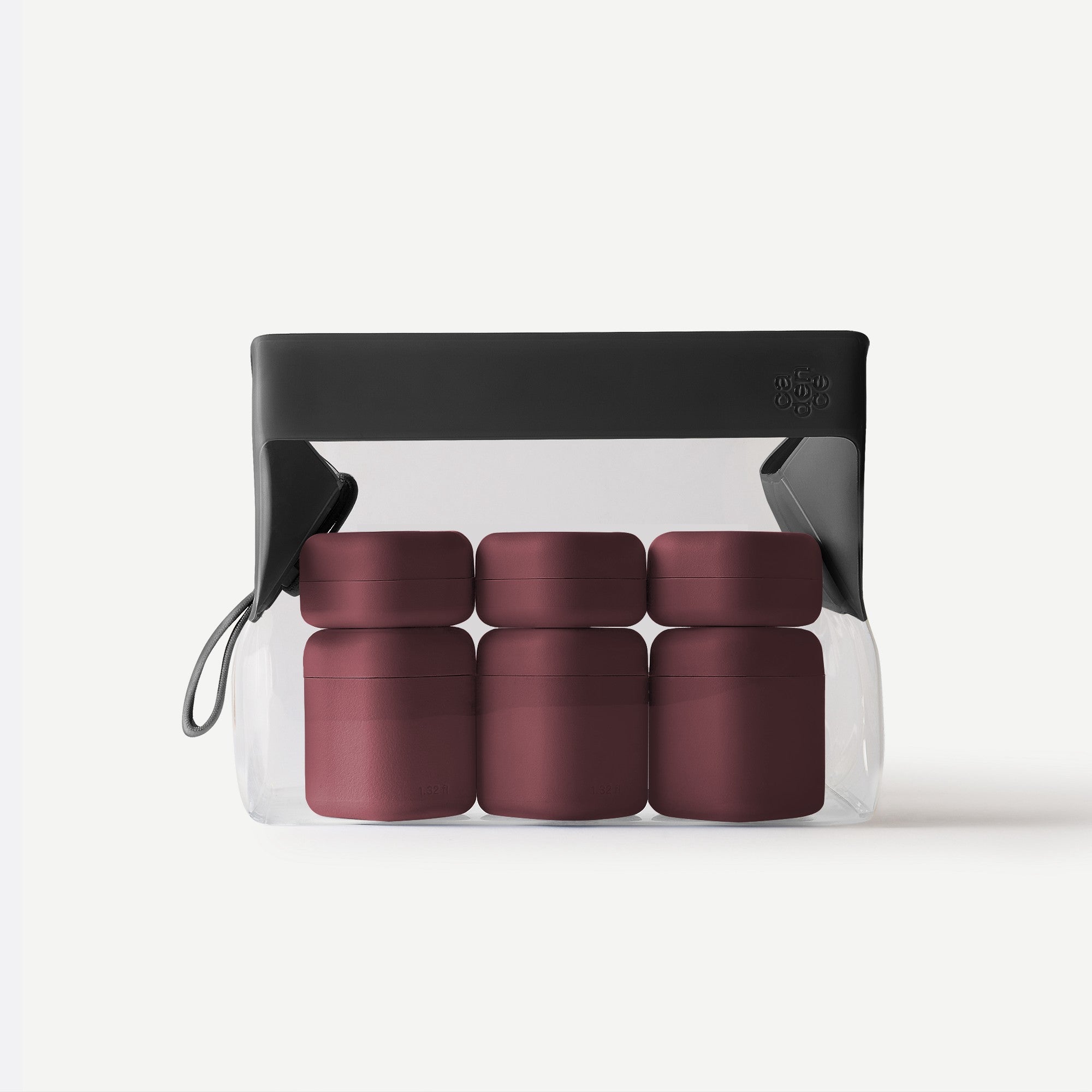 Set of five maroon containers in a clear plastic pack with a black lid on a white background