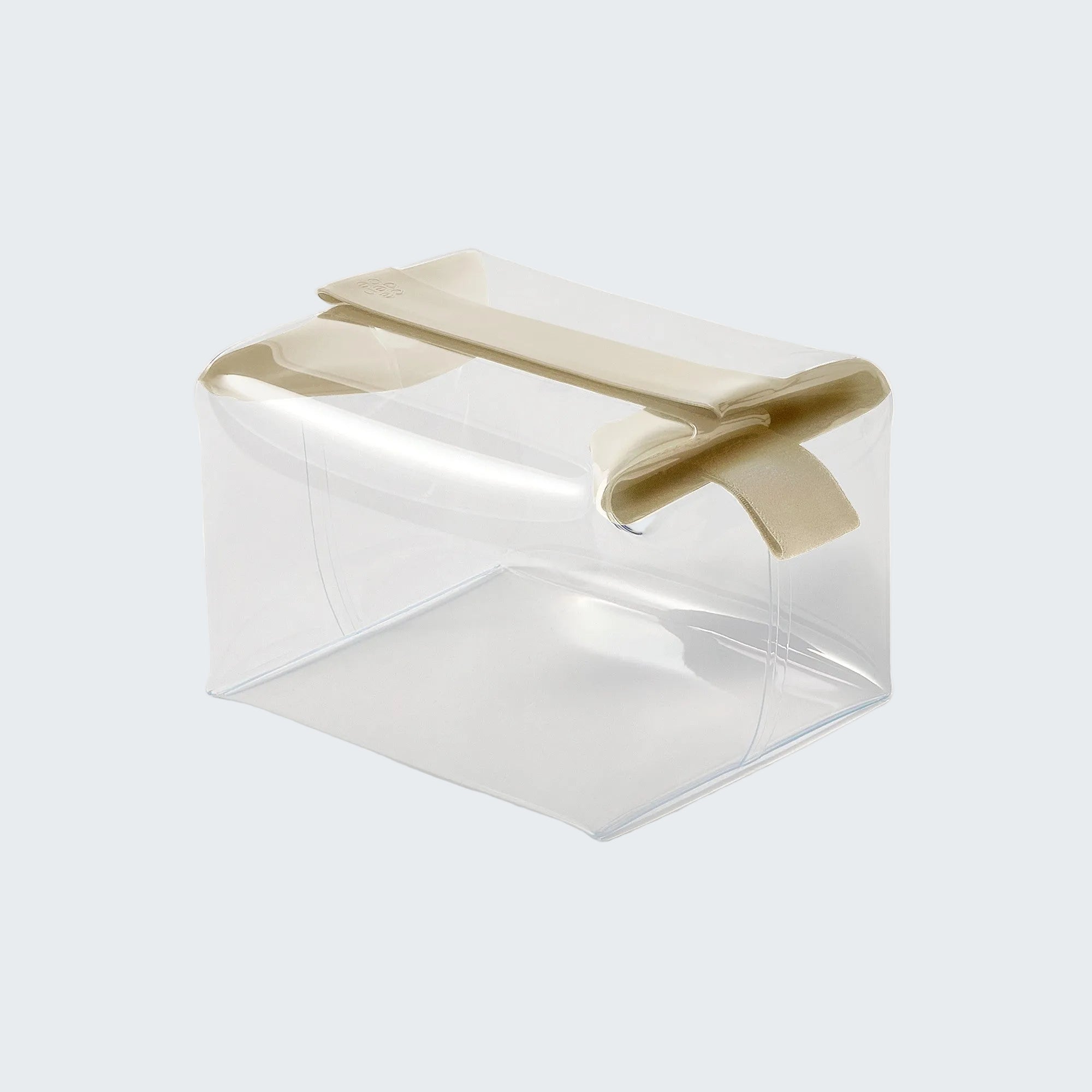 Clear plastic container with beige lid on a white background