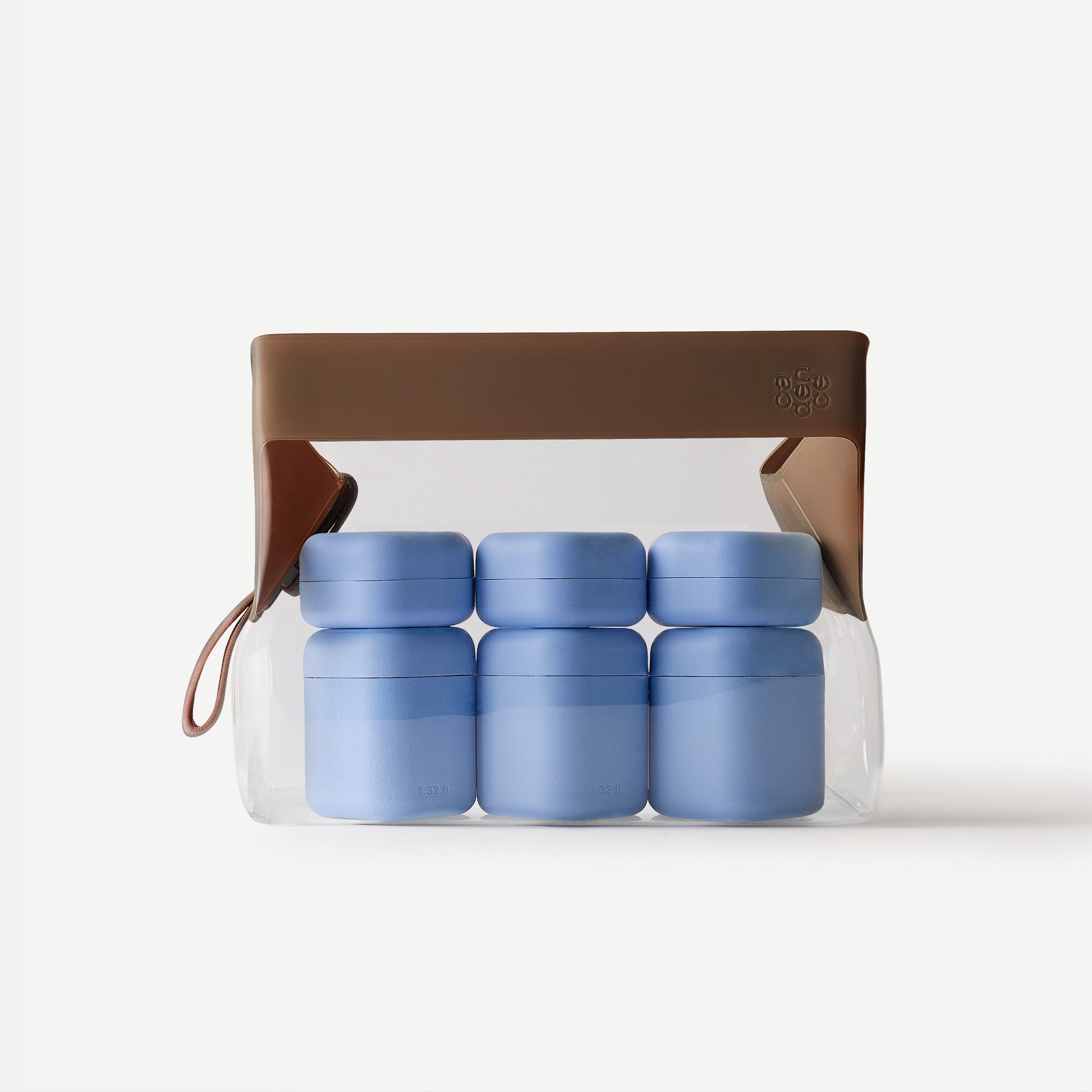 Set of blue containers in a clear plastic pack with a brown handle on a white background