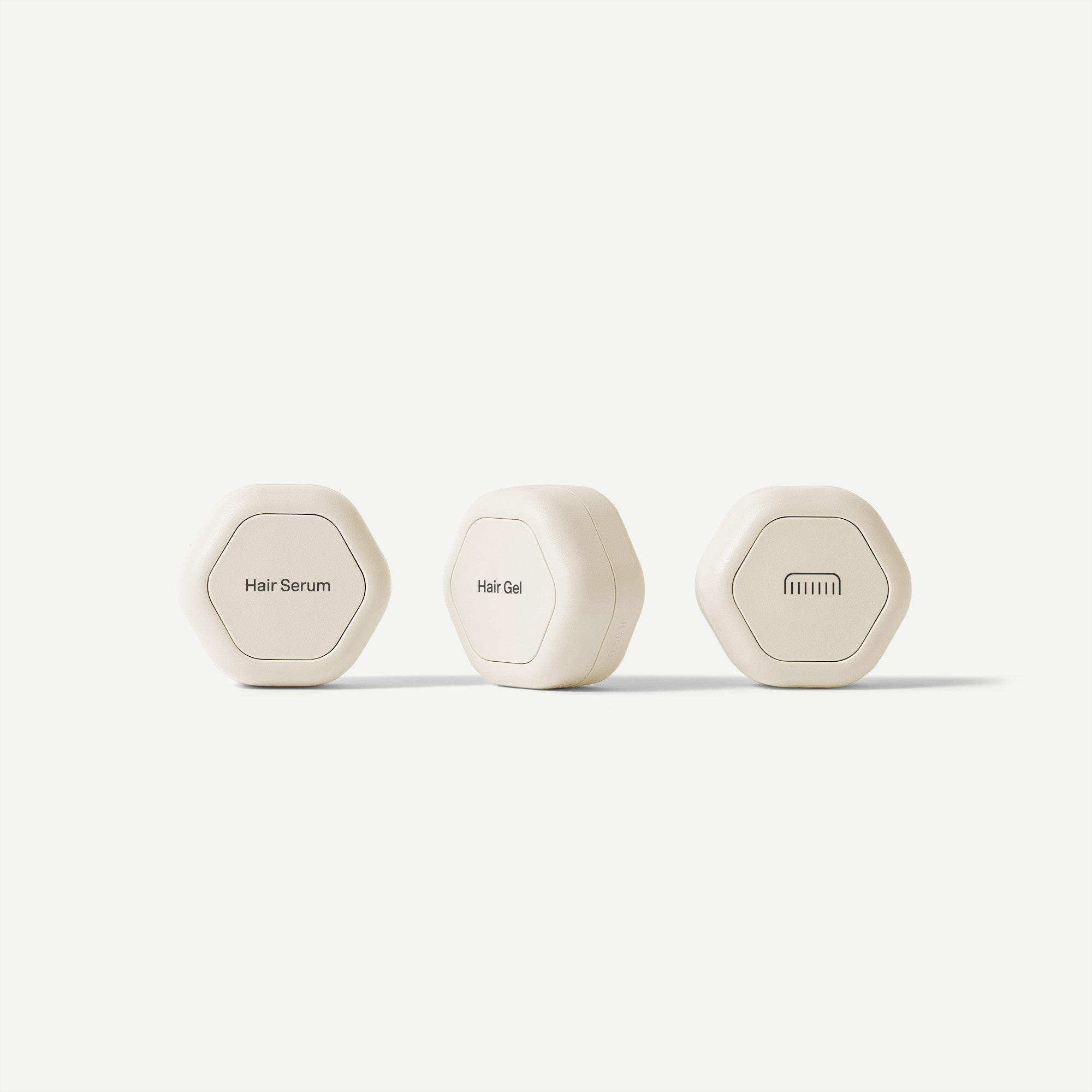 Three white hexagonal containers labeled 'Hair Serum', 'Hair Gel', and 'FHIHAT' on a white background