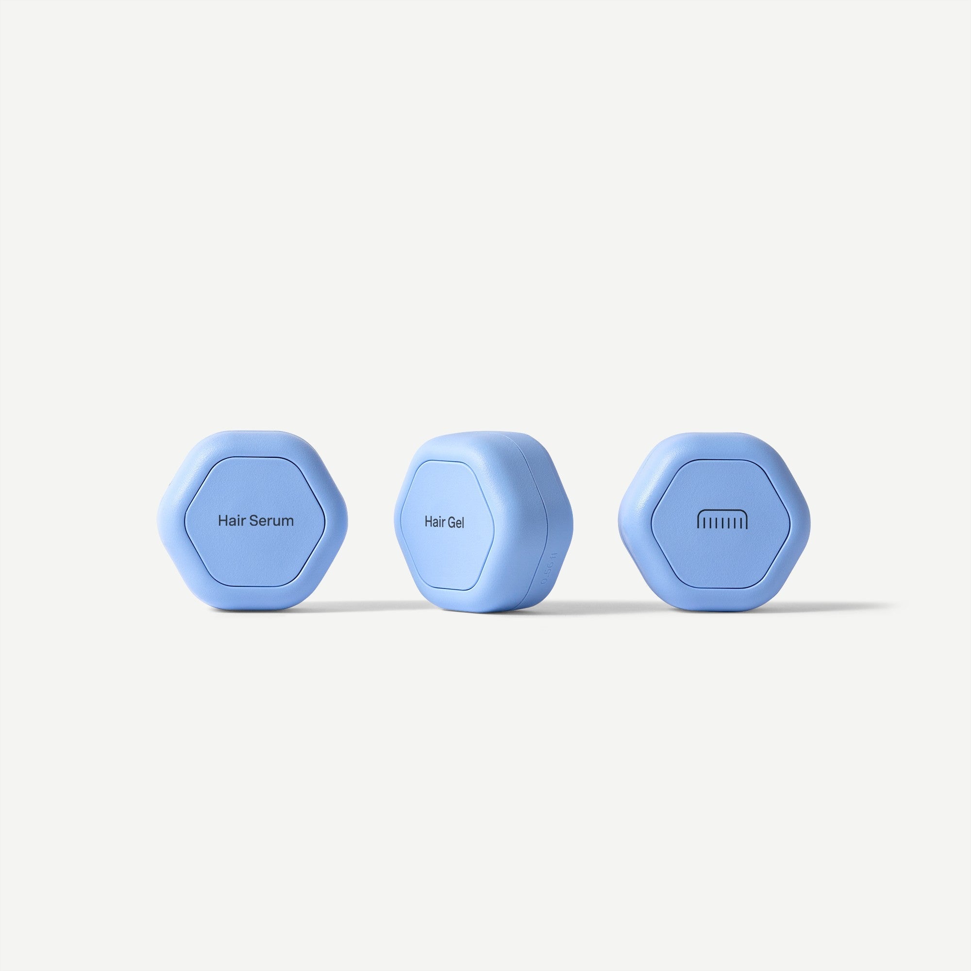 Three blue hexagonal devices with different symbols on a white background