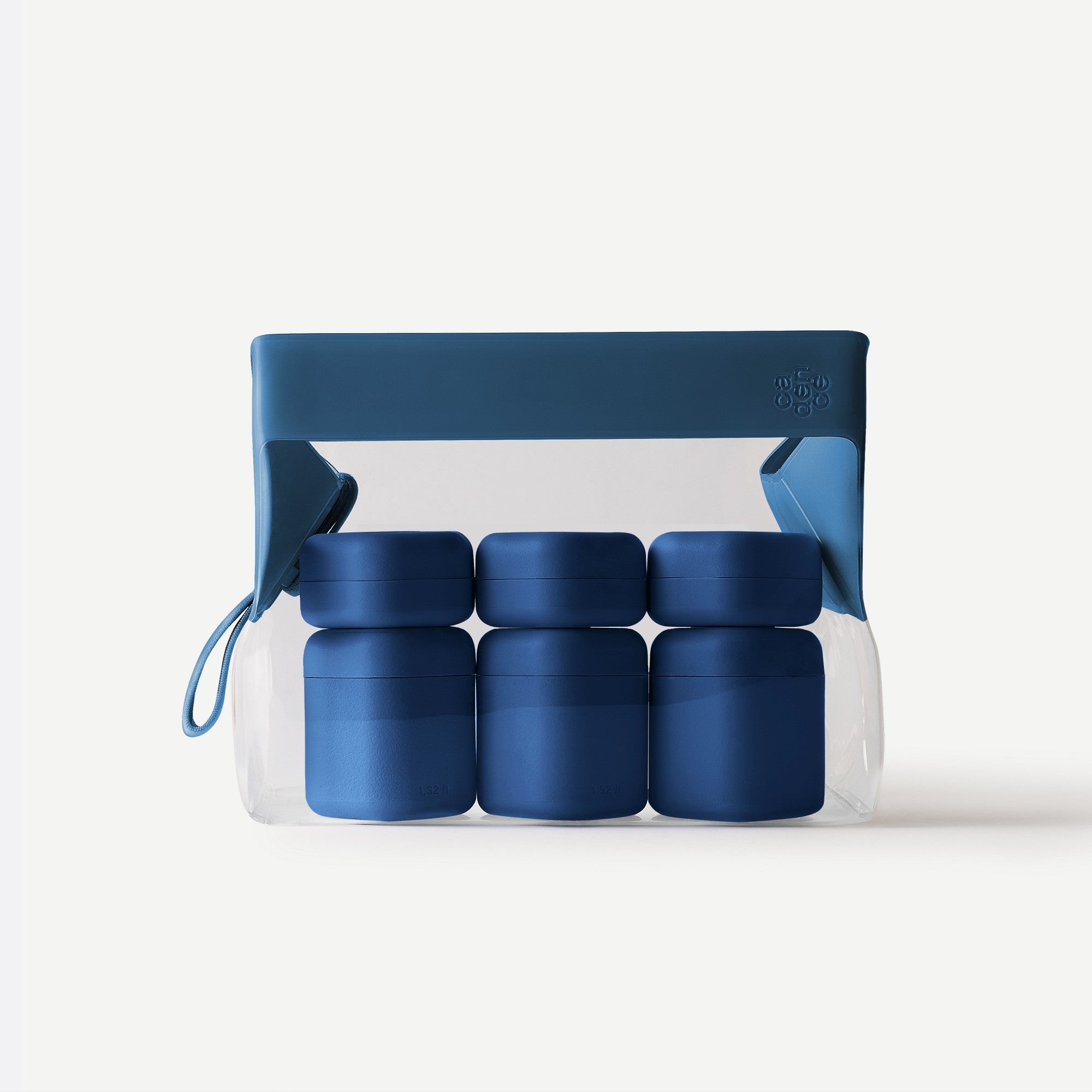 Set of blue containers in a clear plastic bag with a blue lid on a white background