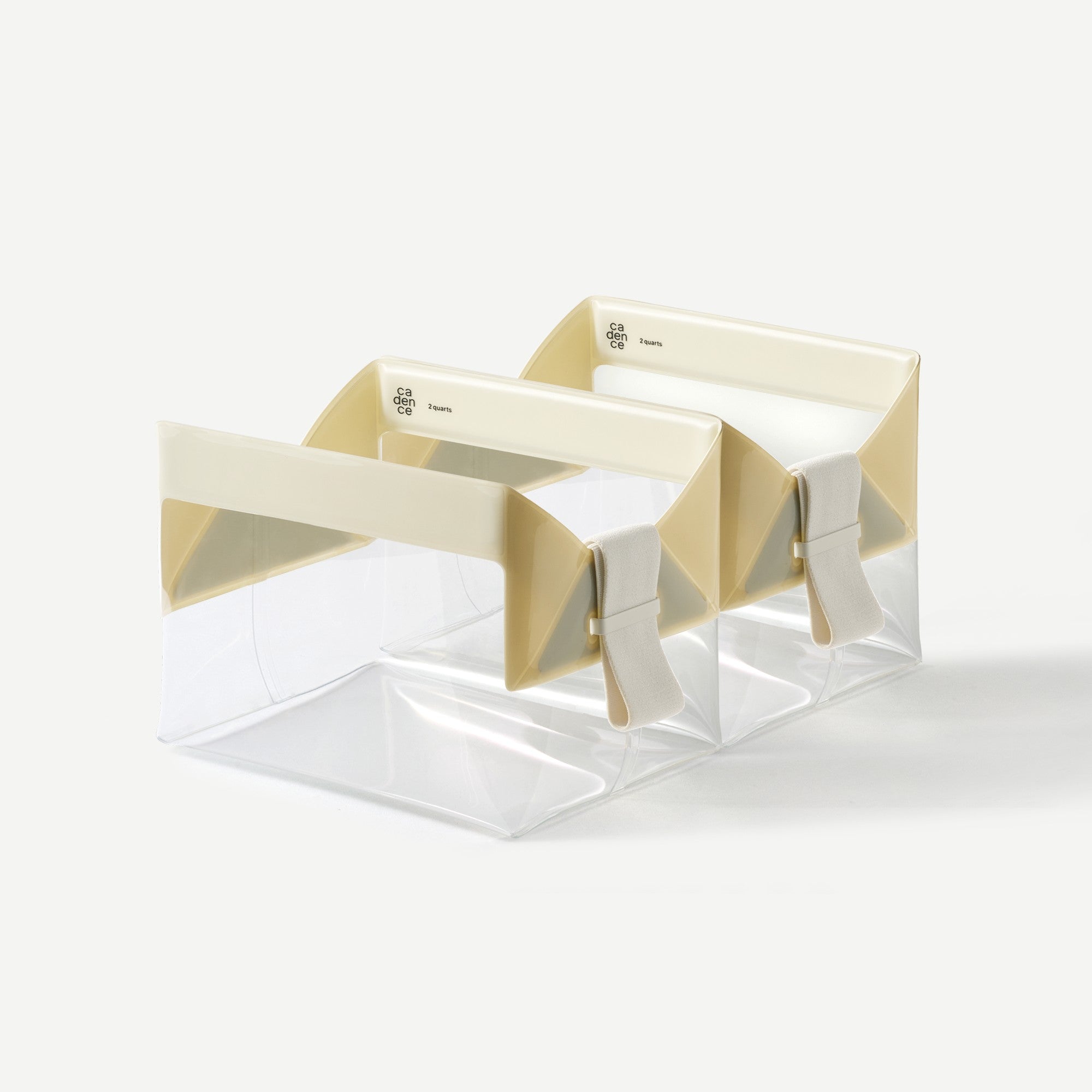 Gold bow tie in a clear packaging box on a white background
