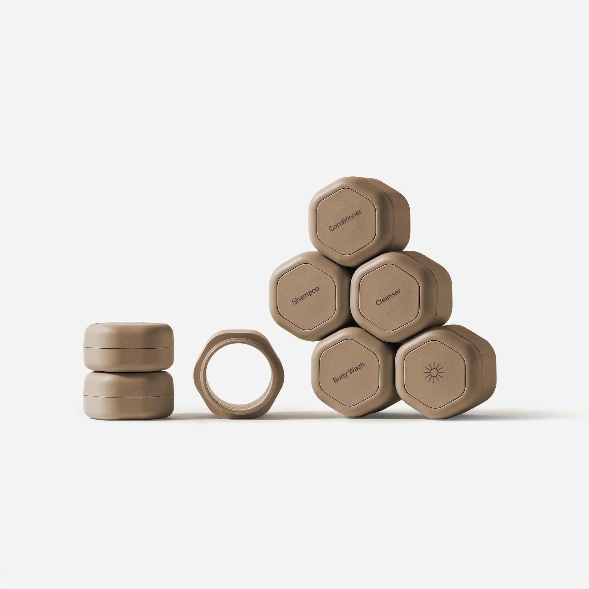 Set of gray hexagonal containers with labels on a white background