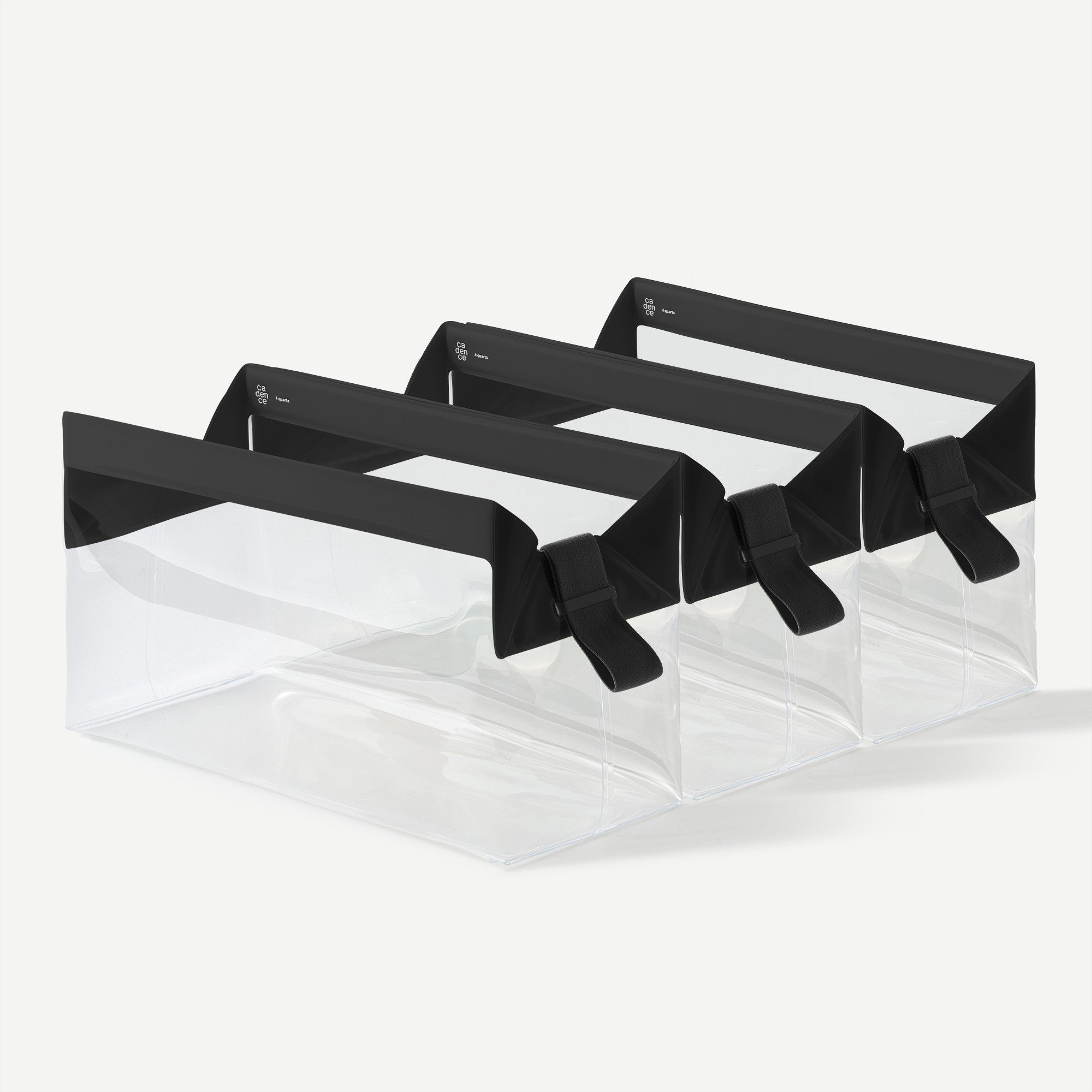 Set of black hair clips with clear plastic bags on a white background