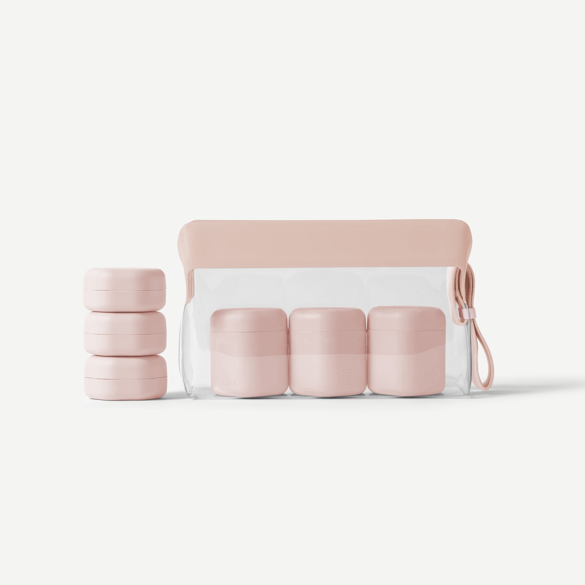 Set of pink containers with a carrying case on a white background