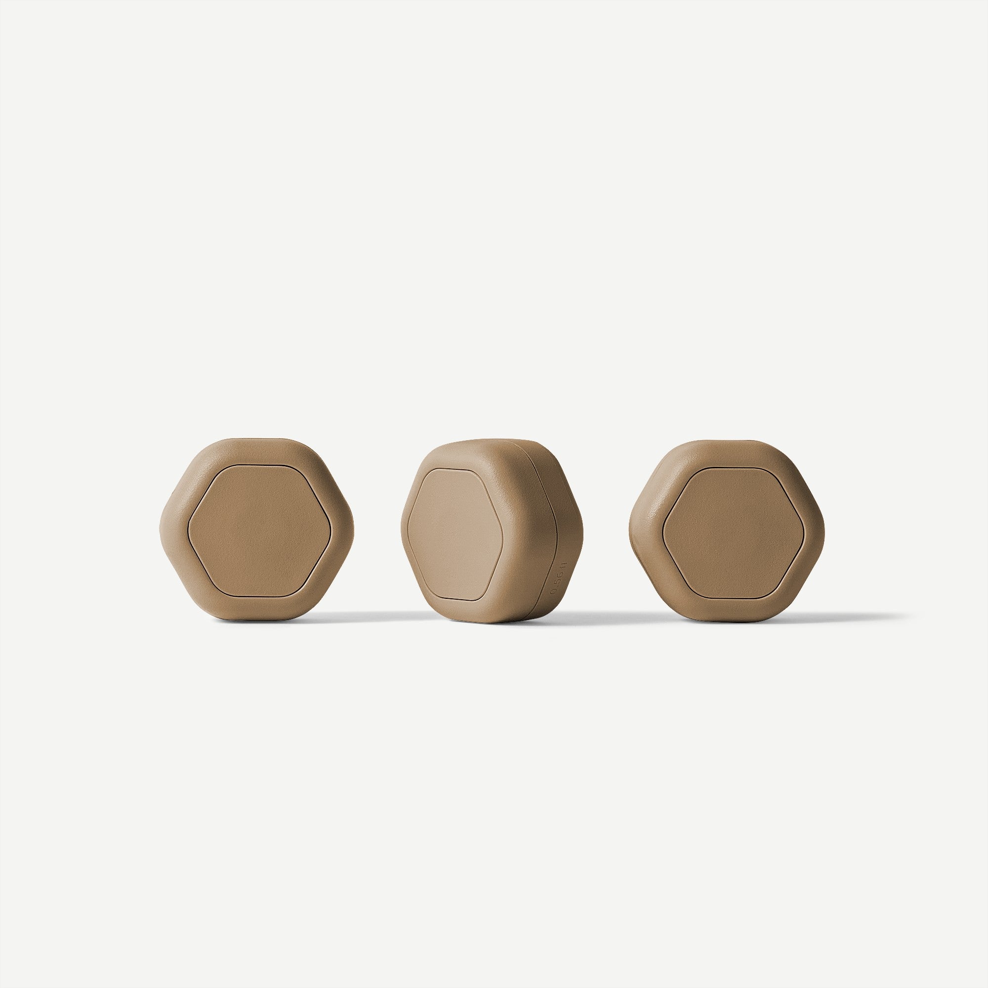 Three hexagonal devices with different symbols on a white background