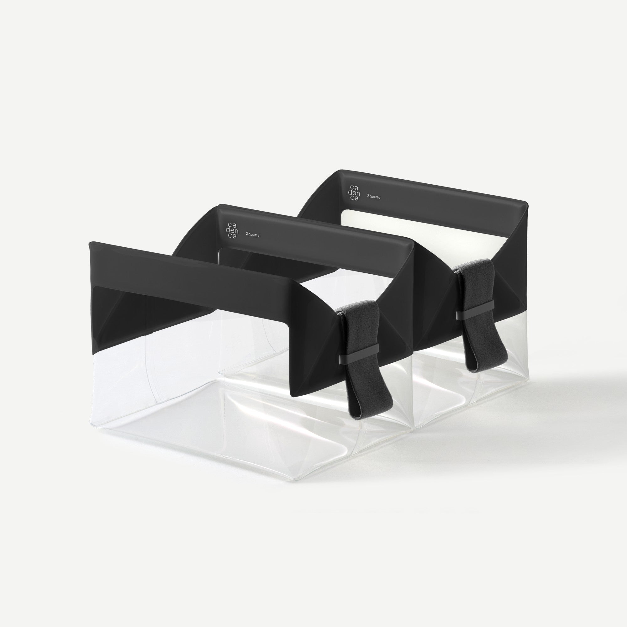Black bow tie on a clear stand against a white background