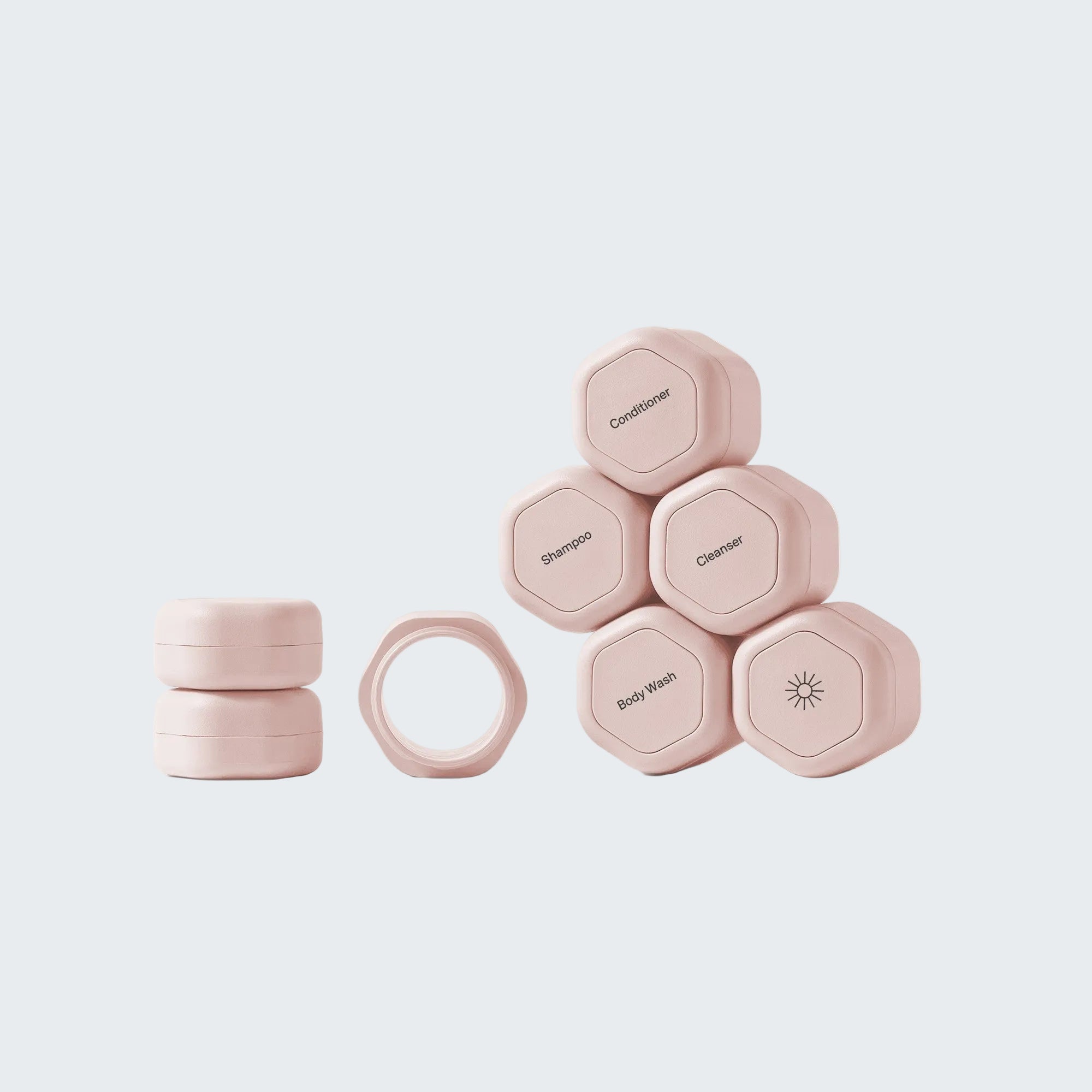 Set of hexagonal containers with labels on a white background