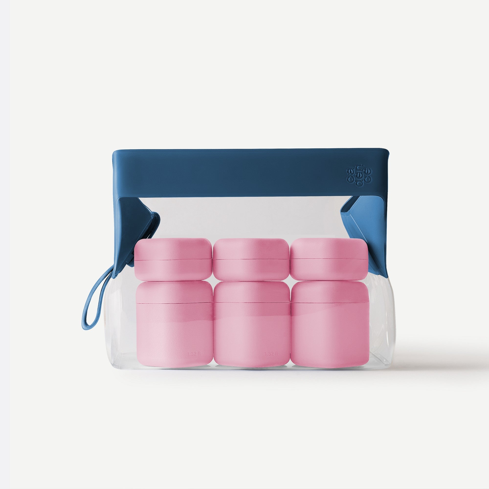Set of pink containers in a clear plastic pack with a blue lid on a white background