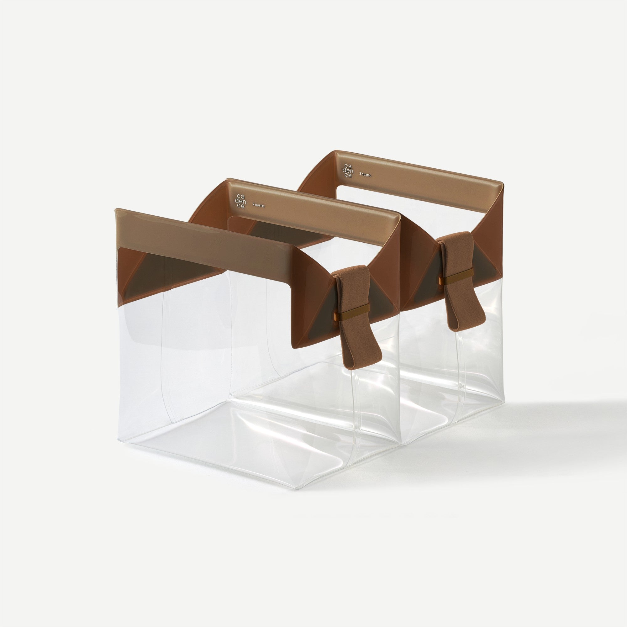 Clear plastic box with brown cardboard lids on a white background