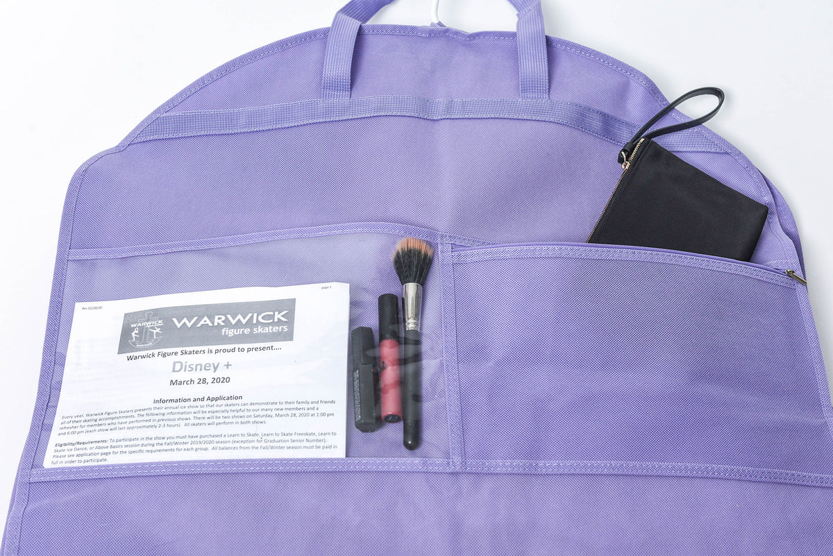 A lavender purple garment bag with multiple pockets, shown holding a printed card, makeup brushes, and a black pouch on a white background.