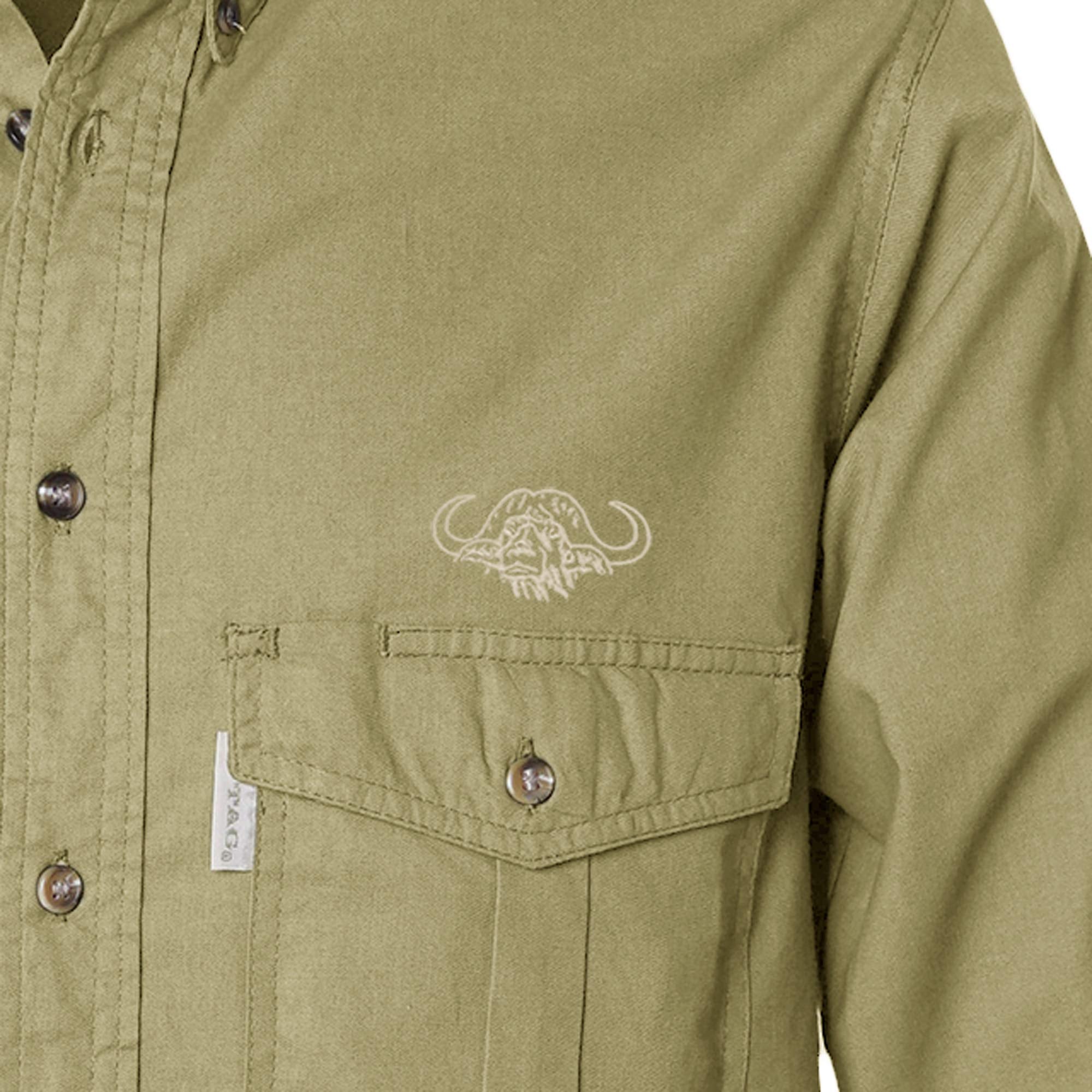 Close-up of a green shirt with a logo and button details