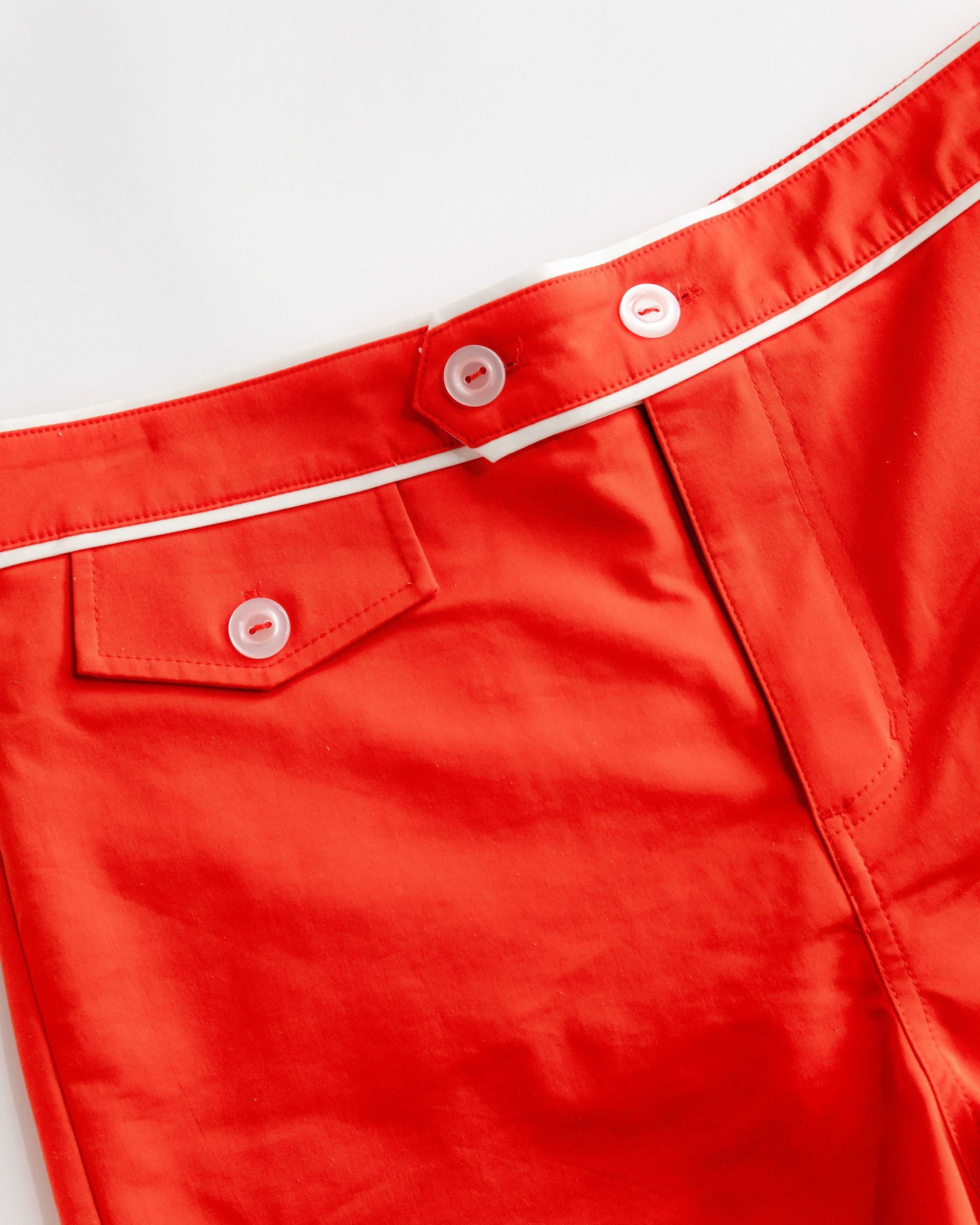 man wearing red trunks